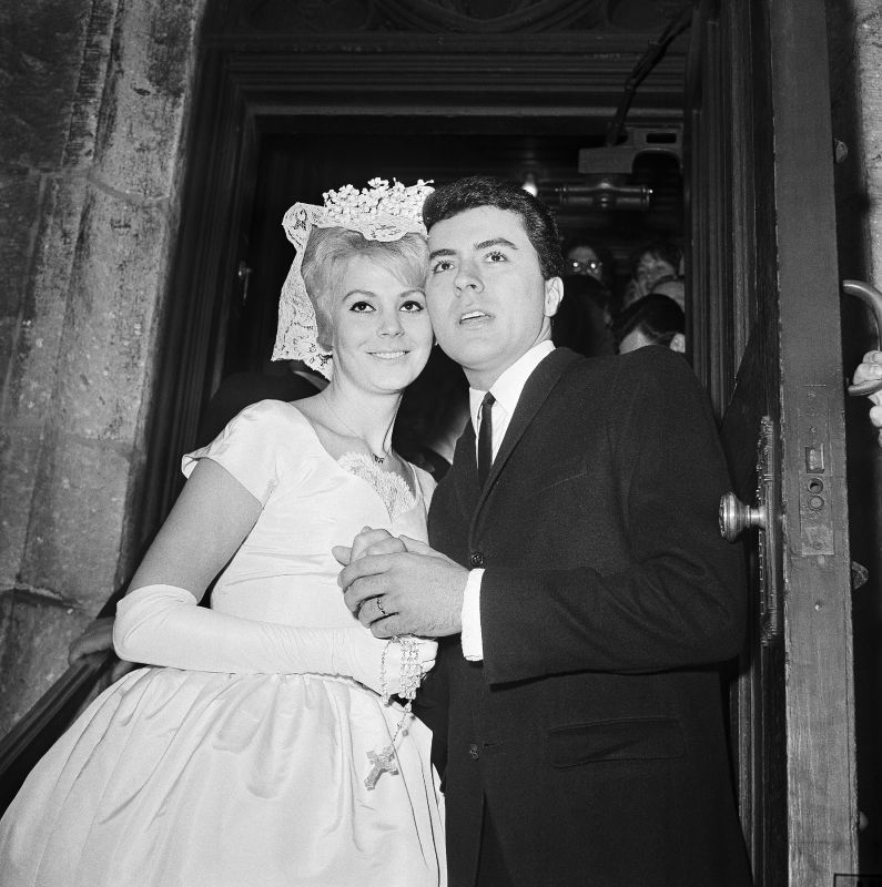 James Darren and his wife Evy Norlund embrace after their marriage at St. Patrick's Cathedral in New York, Feb. 6, 1960.