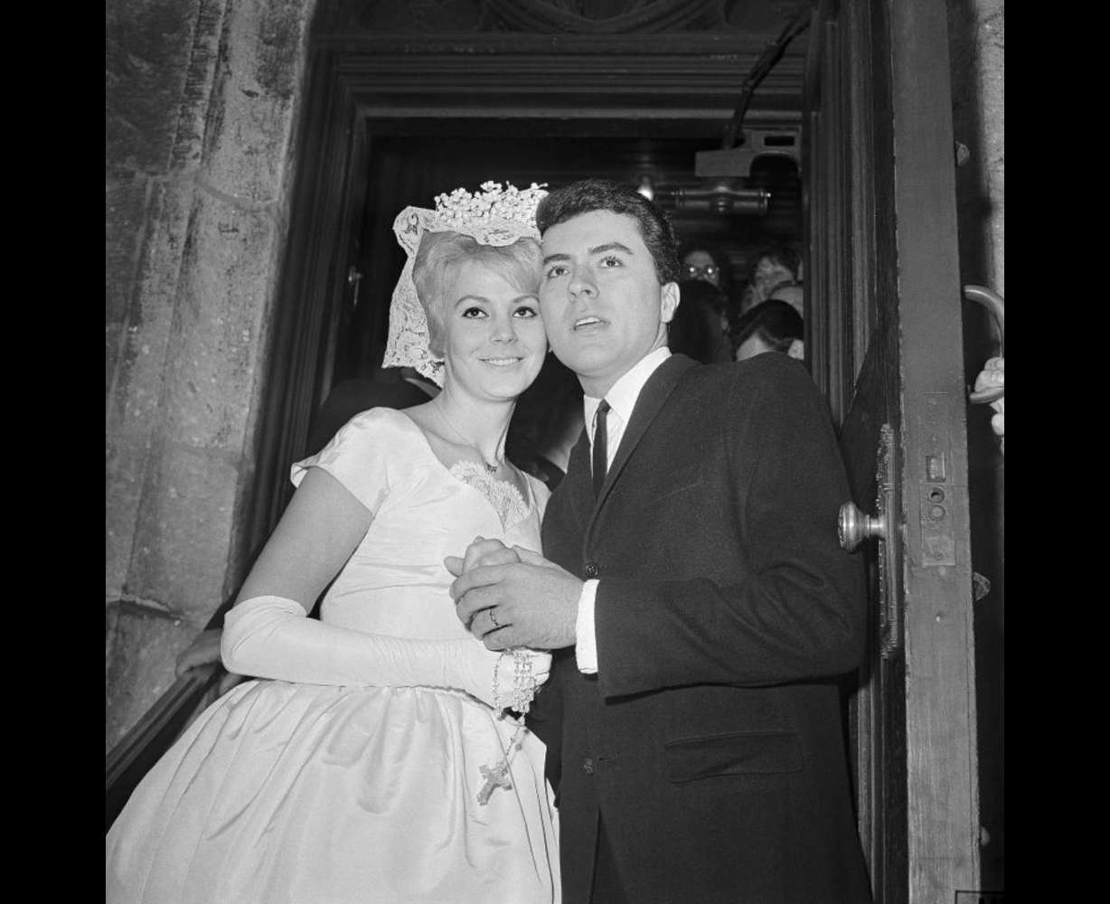 James Darren and his wife Evy Norlund embrace after their marriage at St. Patrick's Cathedral in New York, Feb. 6, 1960.