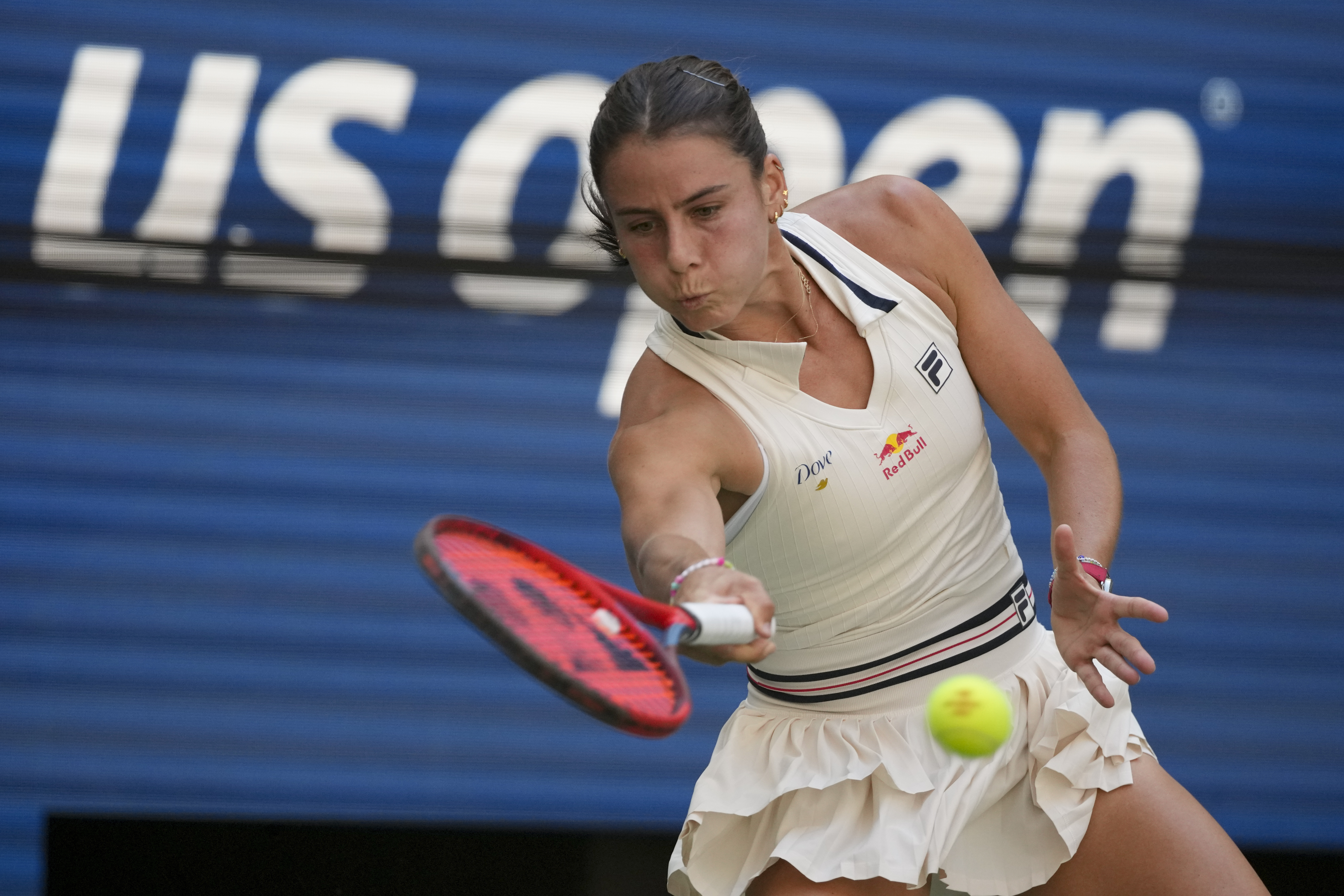Emma Navarro, of the United States, returns a shot to Paula Badosa, of Spain, during the quarterfinals of the U.S. Open tennis championships, Tuesday, Sept. 3, 2024, in New York. 
