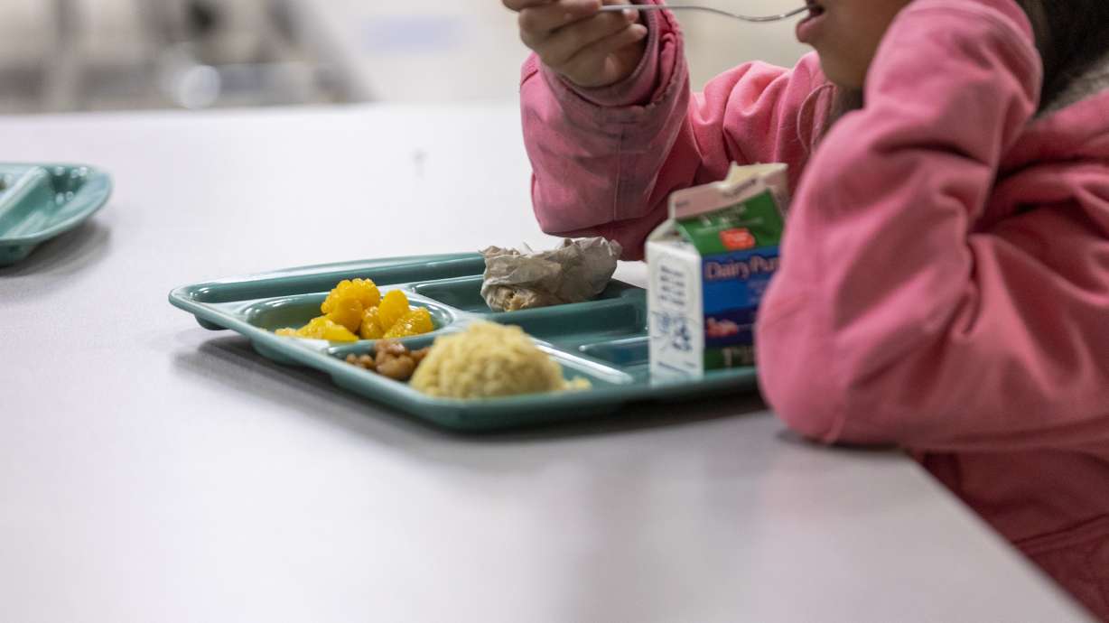 A student eats lunch at Westvale Elementary School in West Jordan on Nov. 7, 2022. To help address student school lunch debt, Utah Gov. Spencer Cox on Tuesday redirected $1.2 million into a new grant program.