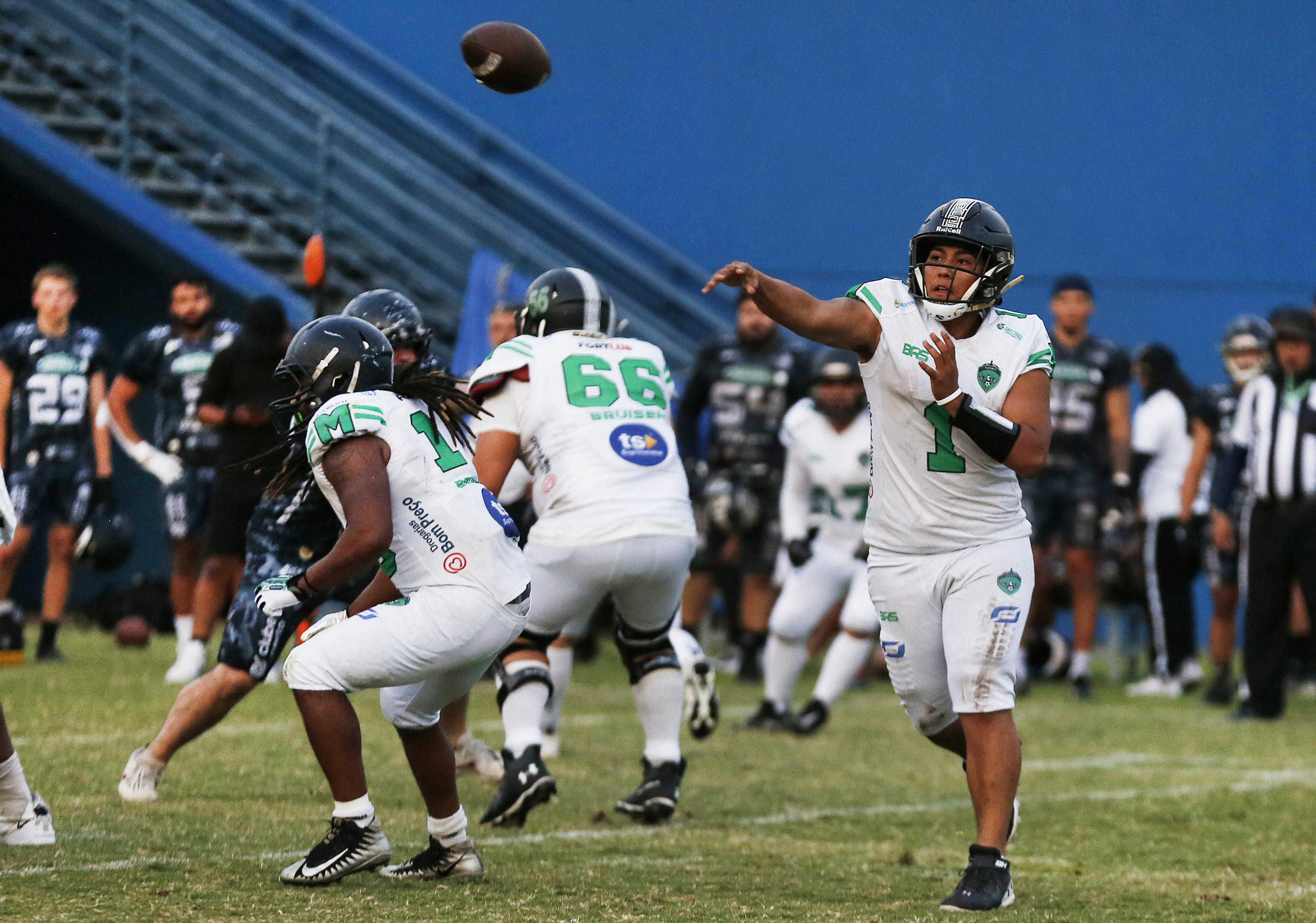 Baré Indigenous Pedro Canuto, Manaus FA's quarterback, throws the ball during a football match against Galo FA at Ismael Benigno stadium in Manaus, Brazil, Saturday, Aug. 24, 2024. 