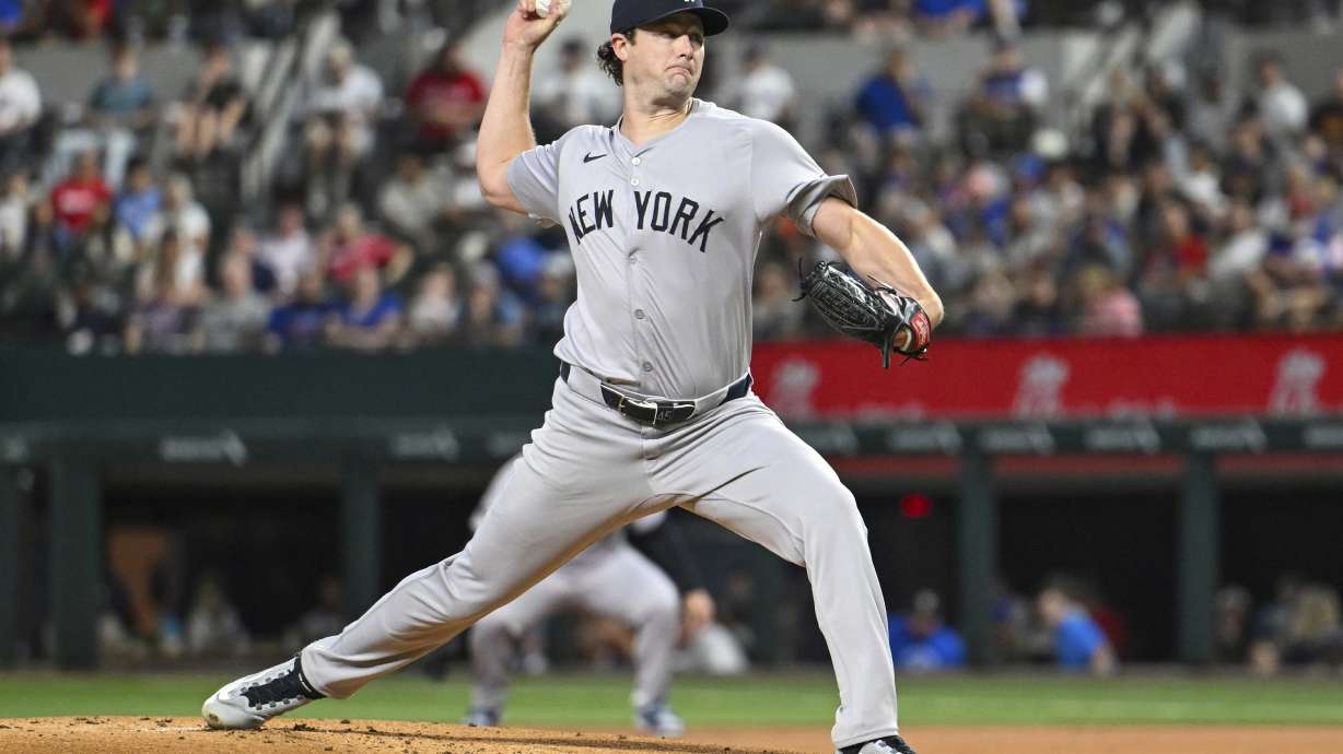 New York Yankees starting pitcher Gerrit Cole throws to the Texas Rangers in the first inning of a baseball game, Monday, Sept. 2, 2024, in Arlington, Texas.