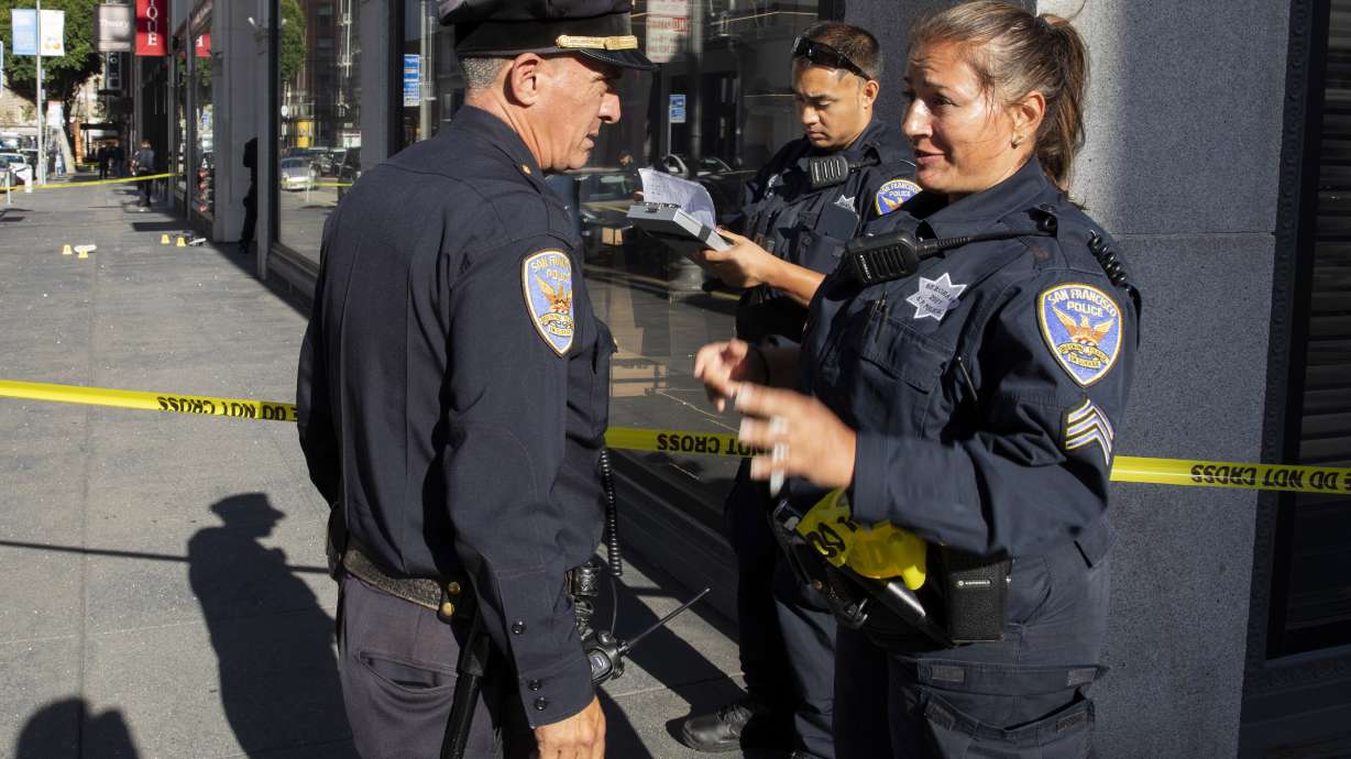 San Francisco Police Department Sgt. Joelle Harrell, right, at the scene of a shooting in Union Square, where San Francisco 49ers rookie wide receiver Ricky Pearsall was shot in the chest during an attempted robbery, Saturday, Aug. 31, 2024, in San Francisco.