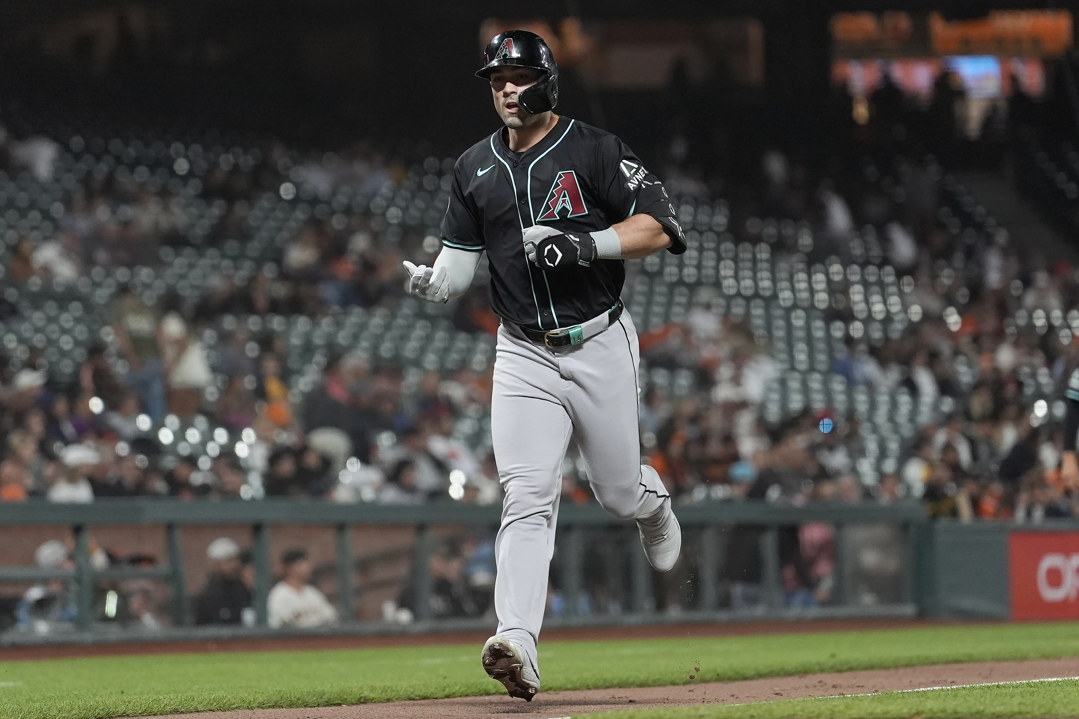 Arizona Diamondbacks' Randal Grichuk reacts after hitting a home run against the San Francisco Giants during the fifth inning of a baseball game in San Francisco, Tuesday, Sept. 3, 2024. 