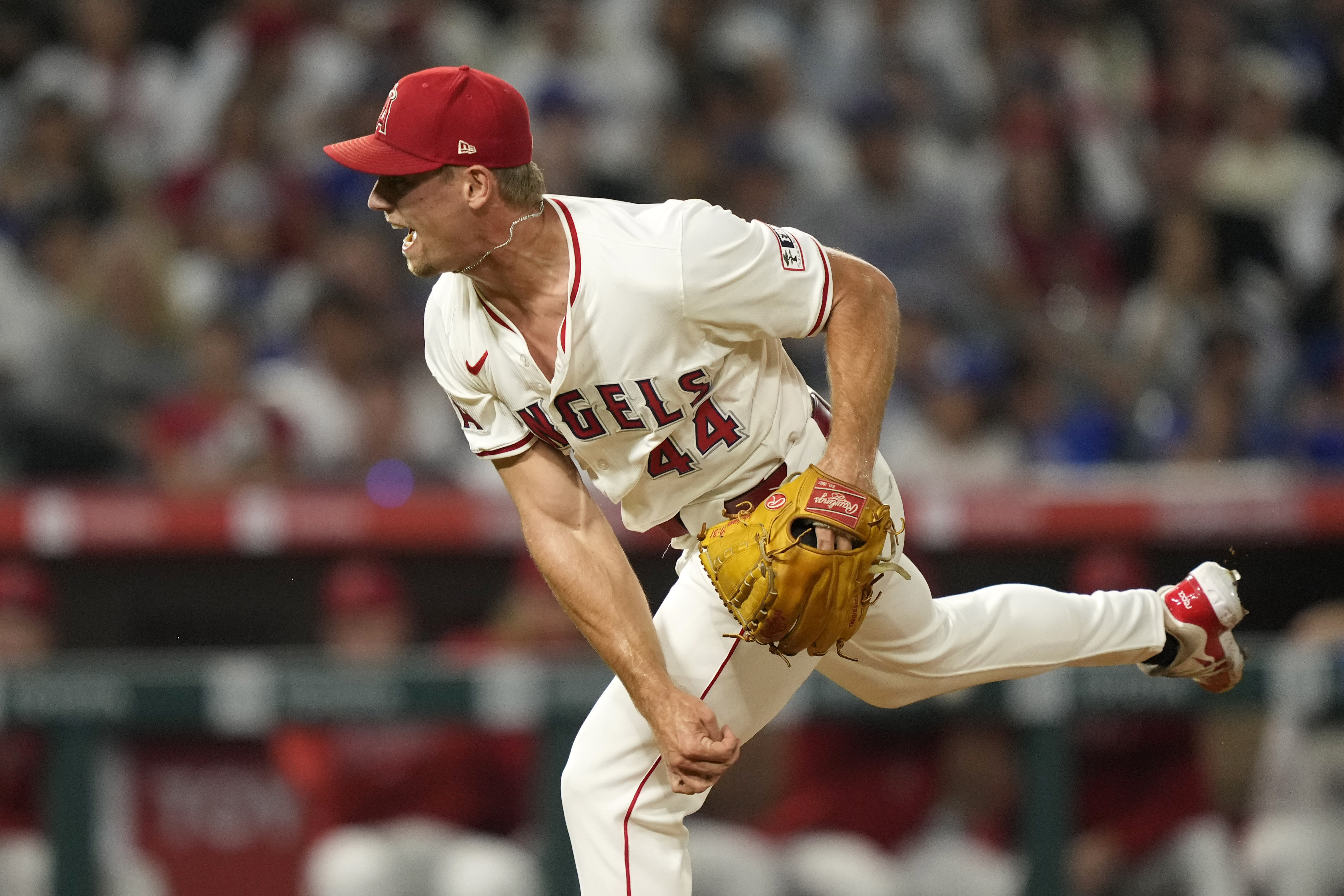 Los Angeles Angels relief pitcher Ben Joyce throws a 105.5 mph pitch as he strikes out Los Angeles Dodgers' Tommy Edman to end the ninth inning of a baseball game, Tuesday, Sept. 3, 2024, in Anaheim, Calif. 