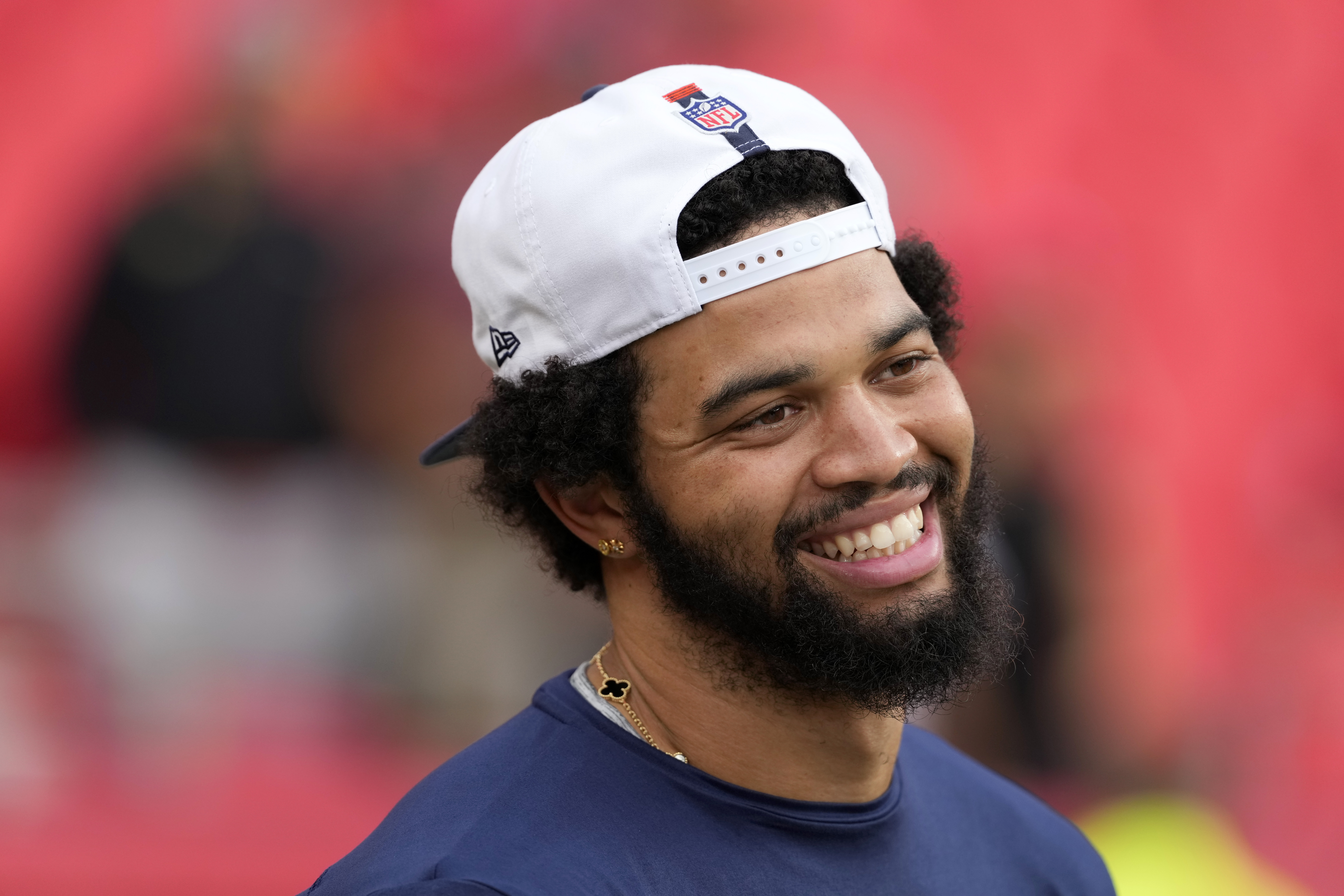 Chicago Bears quarterback Caleb Williams warms up before the start of an NFL preseason football game against the Kansas City Chiefs Thursday, Aug. 22, 2024, in Kansas City, Mo. 