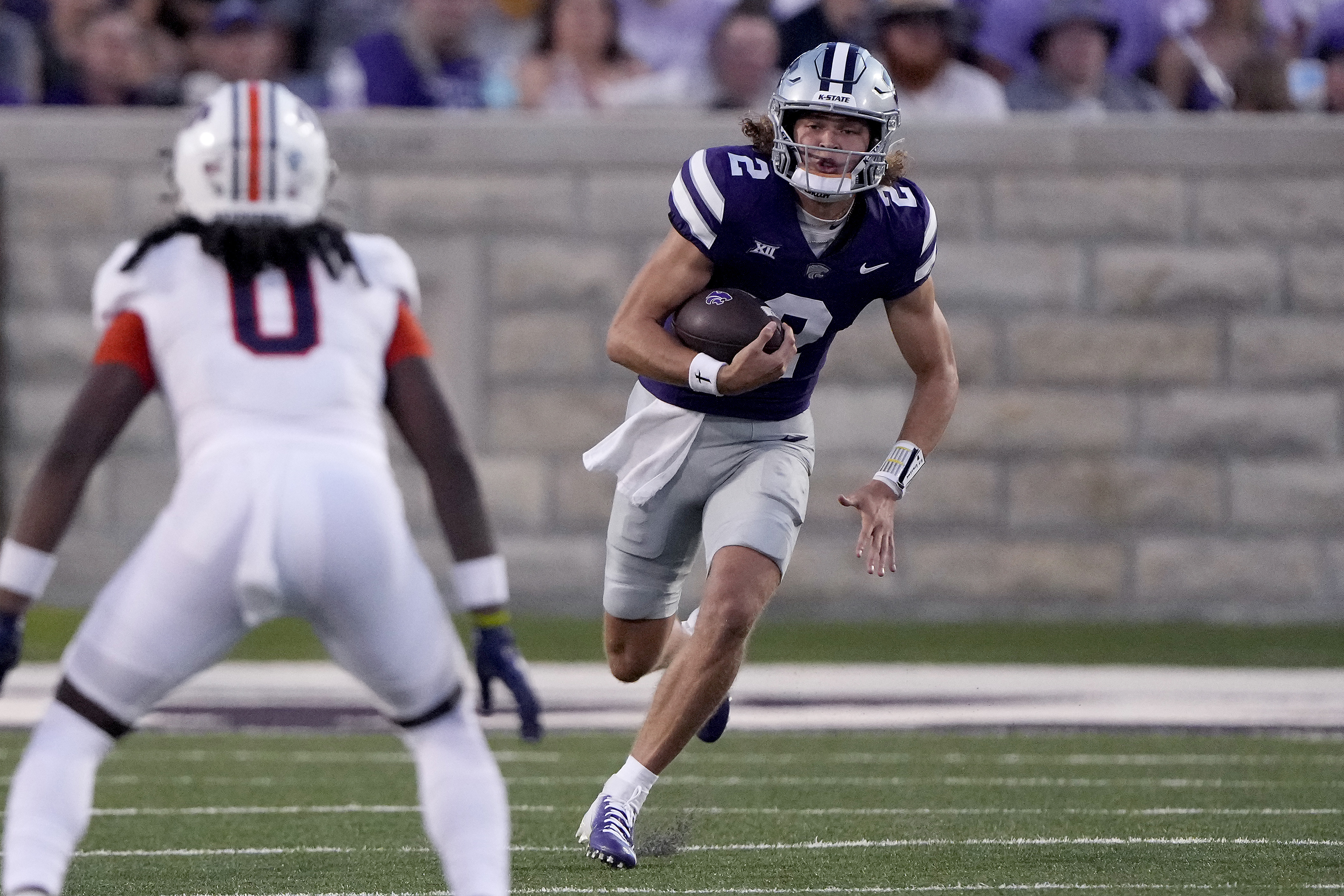 Kansas State quarterback Avery Johnson (2) runs the ball during the second half of an NCAA college football game against UT Martin Saturday, Aug. 31, 2024, in Manhattan, Kan.
