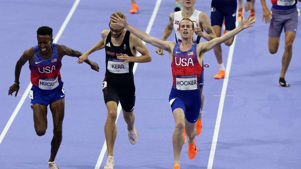 Cole Hocker, of the United States, crosses the finish line to win the men's 1500 meters final at the 2024 Summer Olympics, Tuesday, Aug. 6, 2024, in Saint-Denis, France.