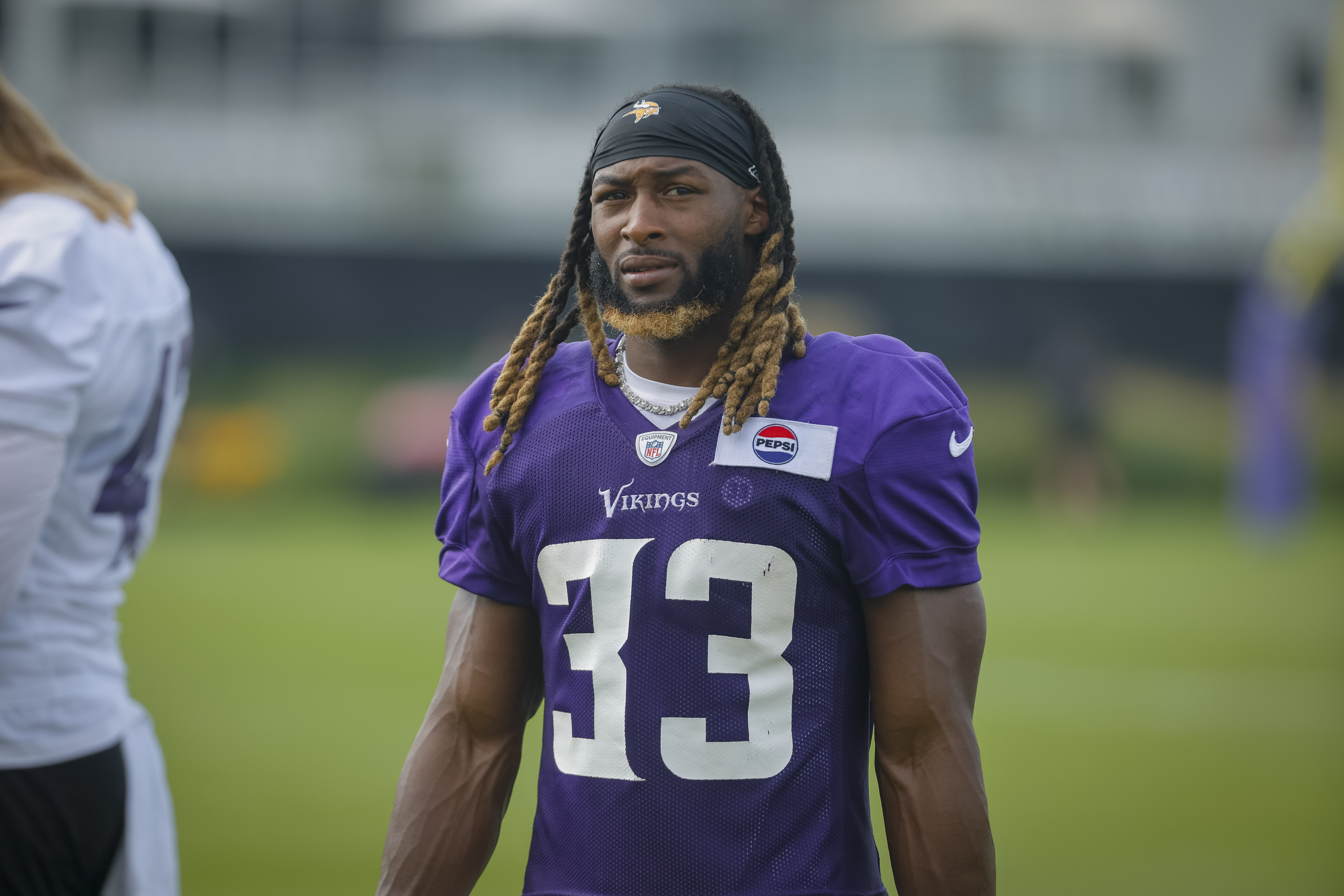 FILE - Minnesota Vikings running back Aaron Jones (33) is seen after an NFL football training camp, July 27, 2024 in Eagan, Minn. 