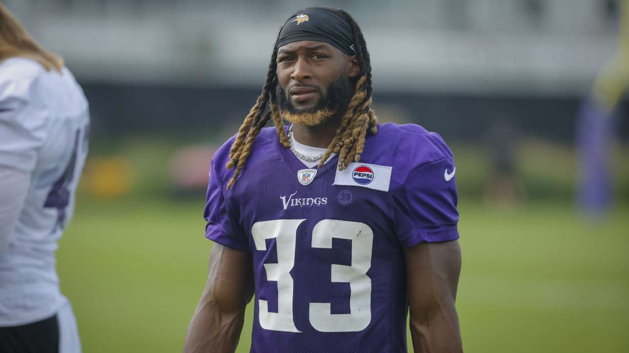 FILE - Minnesota Vikings running back Aaron Jones (33) is seen after an NFL football training camp, July 27, 2024 in Eagan, Minn.