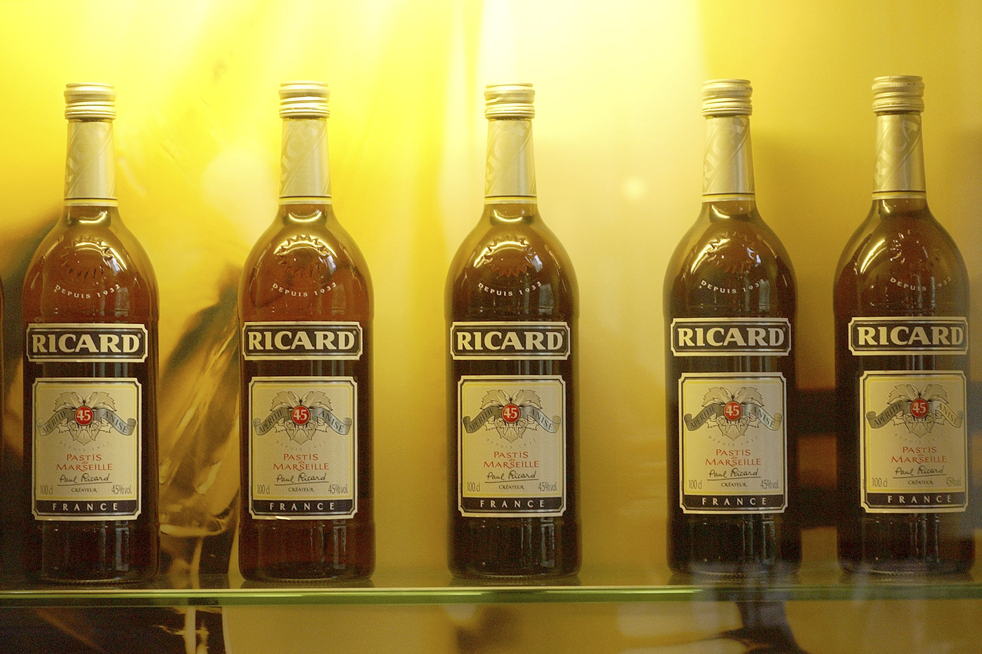 FILE - Bottles of Ricard liquor are seen in group Pernod-Ricard headquarters in Paris, April 21, 2005. 
