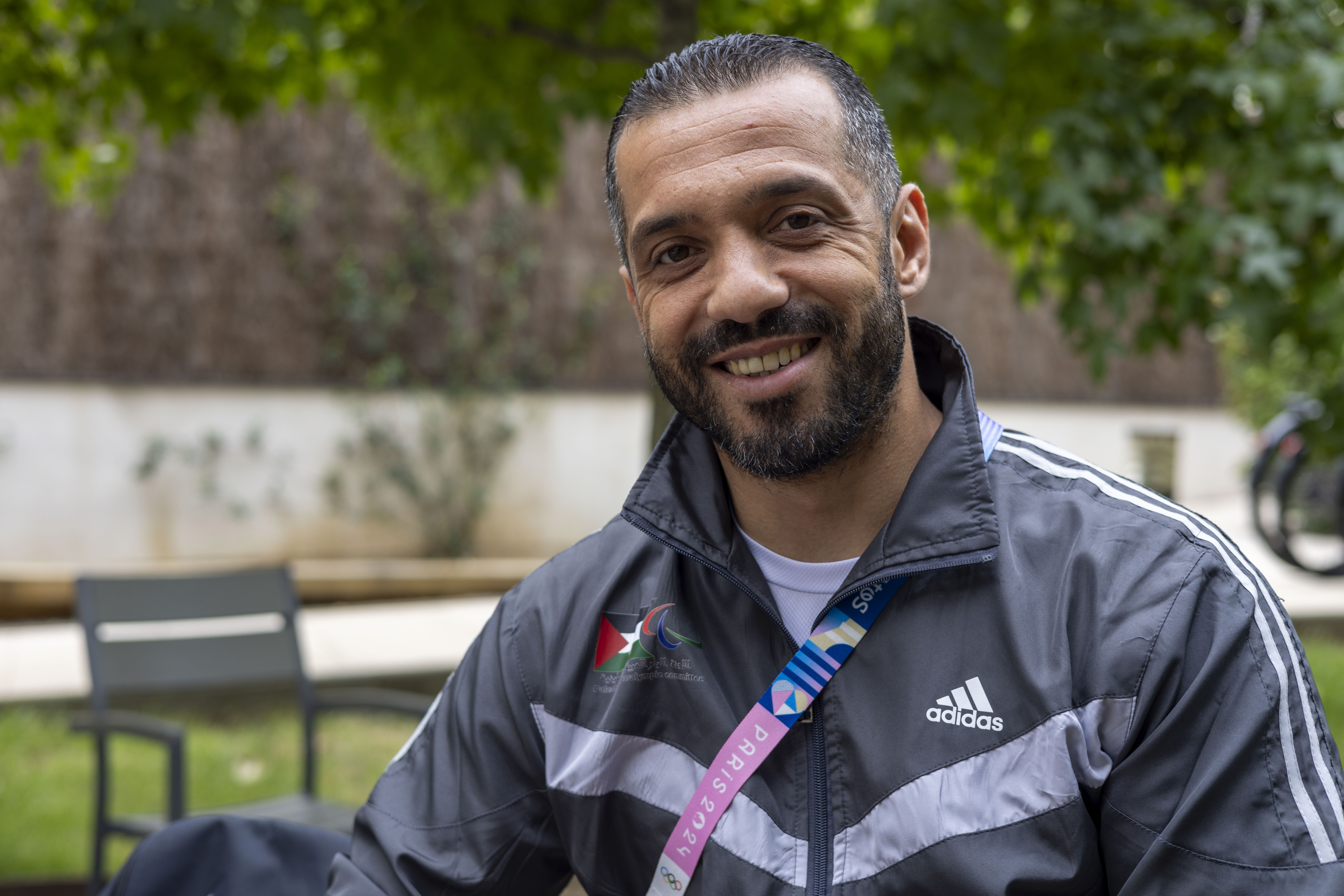 Palestinian athlete Fadi Aldeeb poses for a photograph outside the athletes' village at the Paralympic Games in Paris, Tuesday, Sept. 3, 2024. 