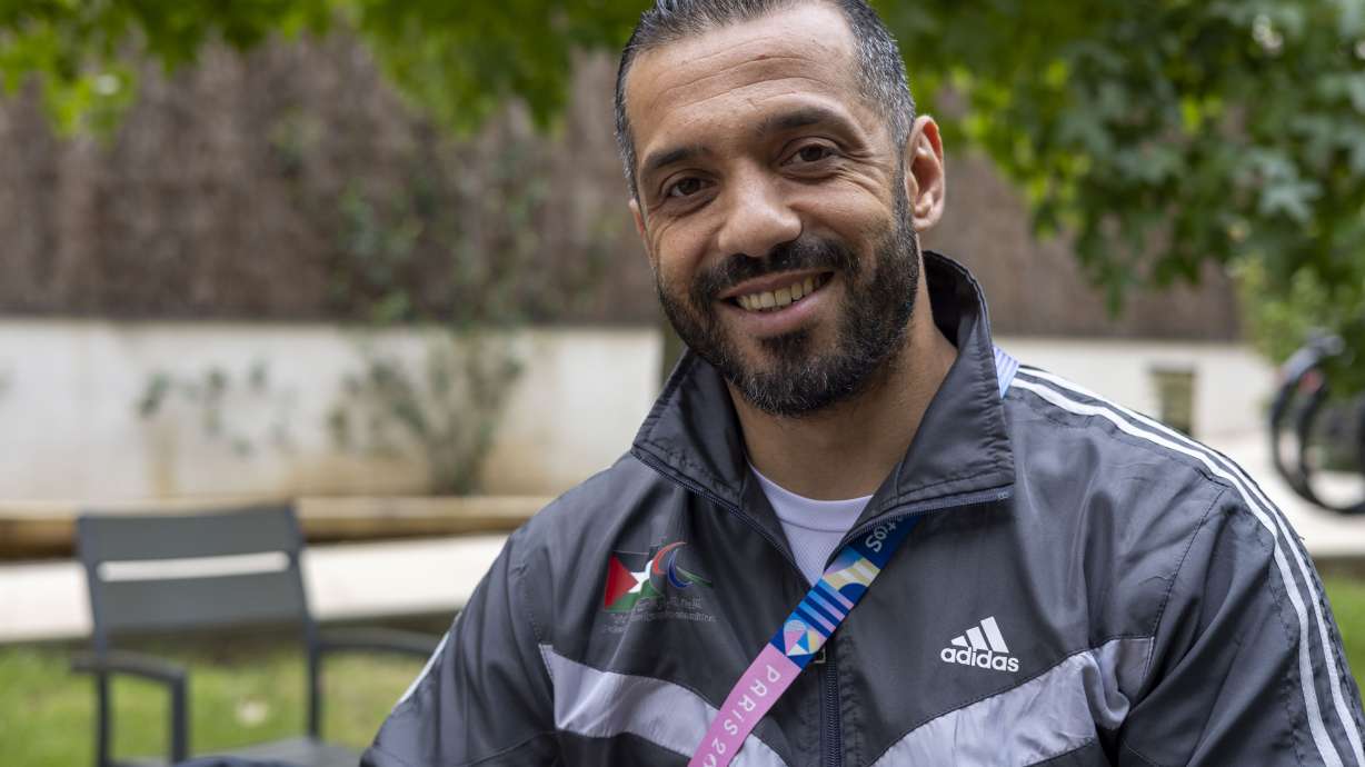 Palestinian athlete Fadi Aldeeb poses for a photograph outside the athletes' village at the Paralympic Games in Paris, Tuesday, Sept. 3, 2024.
