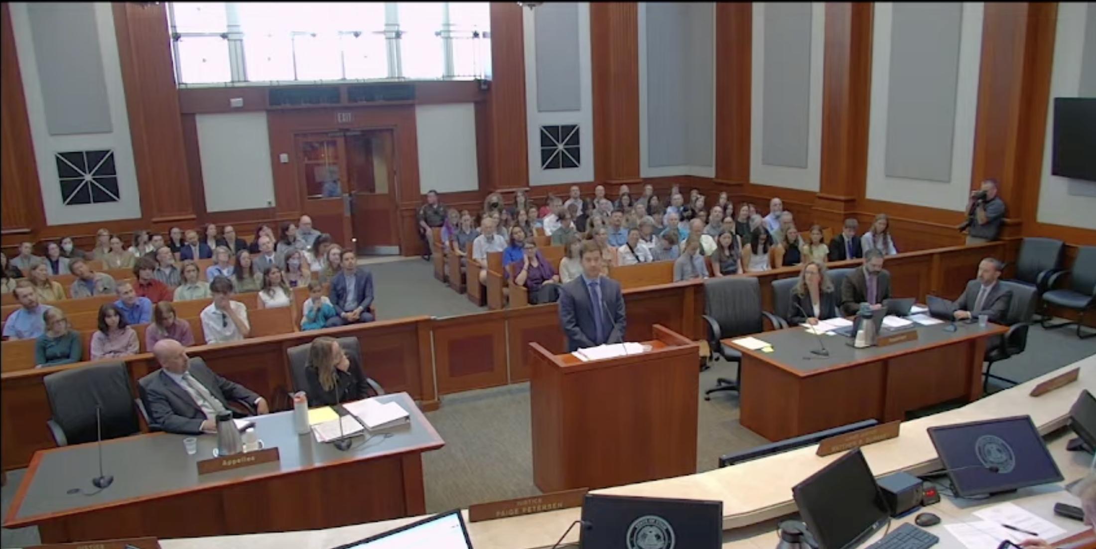 Youth who filed a lawsuit contesting Utah's fossil fuel policies listen as their attorney argues before the Utah Supreme Court on Wednesday. They argued that their case should not have been dismissed by a lower court.