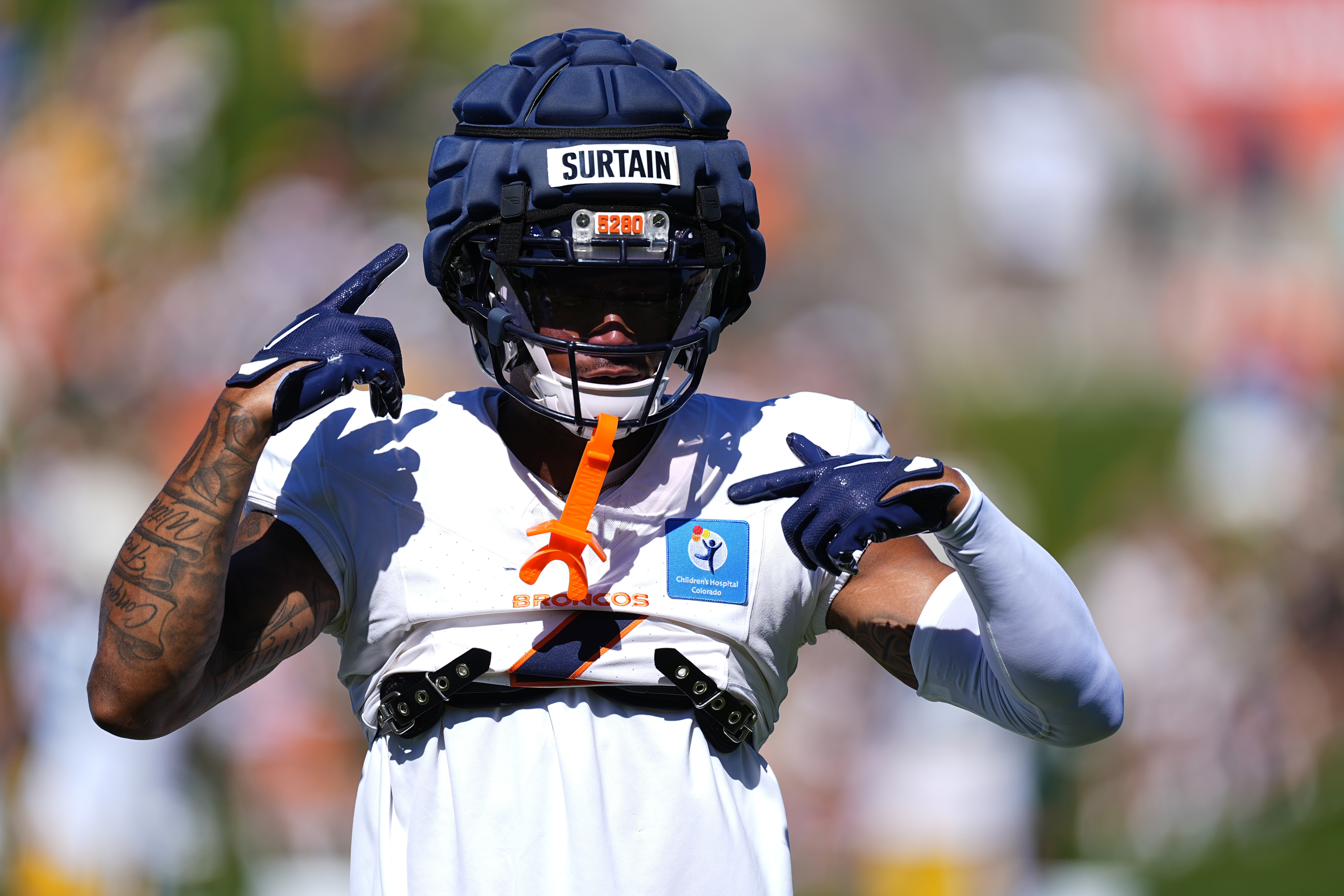 Denver Broncos cornerback Pat Surtain II takes part in drills during a joint NFL football practice with the Green Bay Packers, Friday, Aug. 16, 2024, in Centennial, Colo.