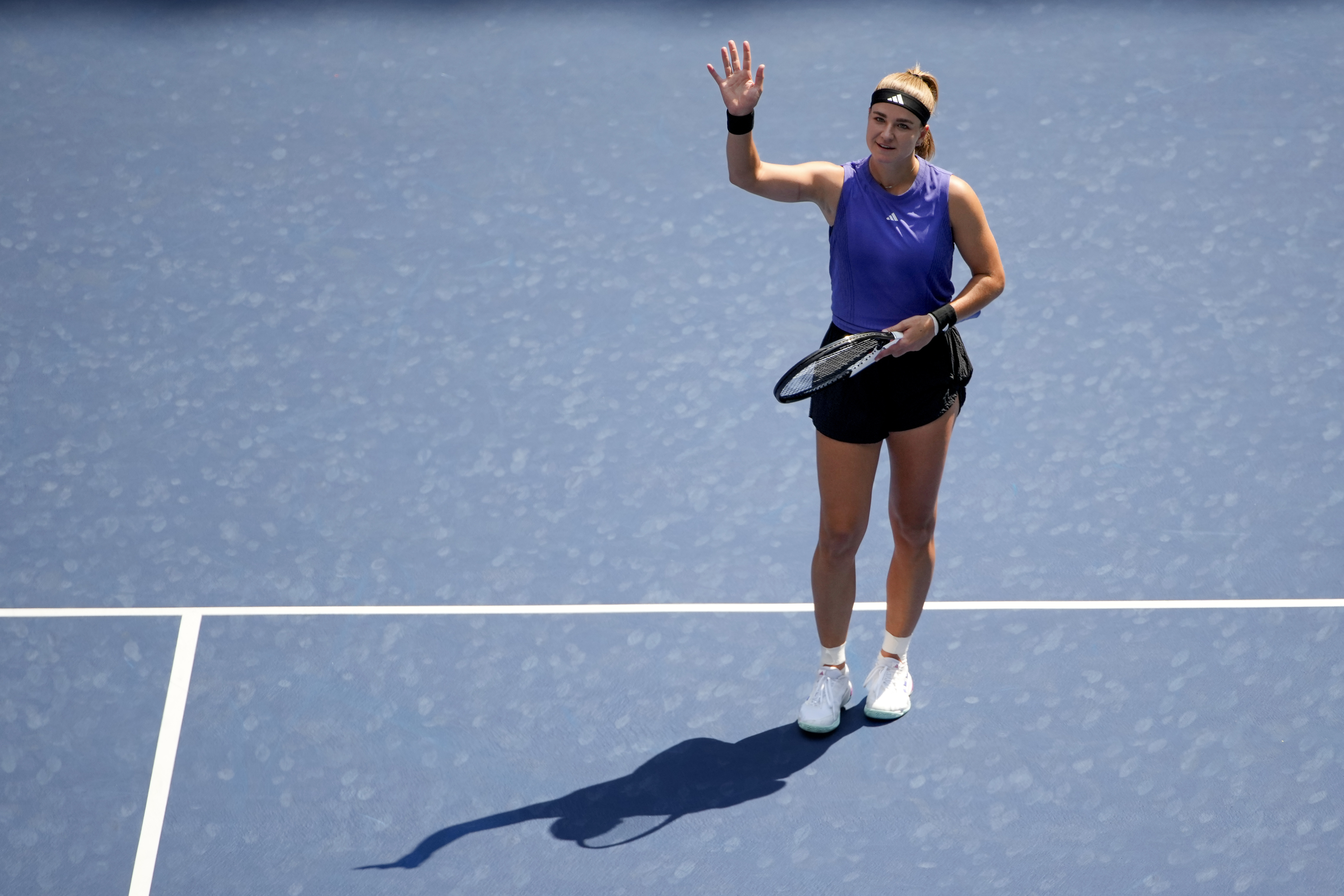 Karolina Muchova, of the Czech Republic, waves to the crowd after defeating Beatriz Haddad Maia, of Brazil, during the quarterfinals of the U.S. Open tennis championships, Wednesday, Sept. 4, 2024, in New York. 