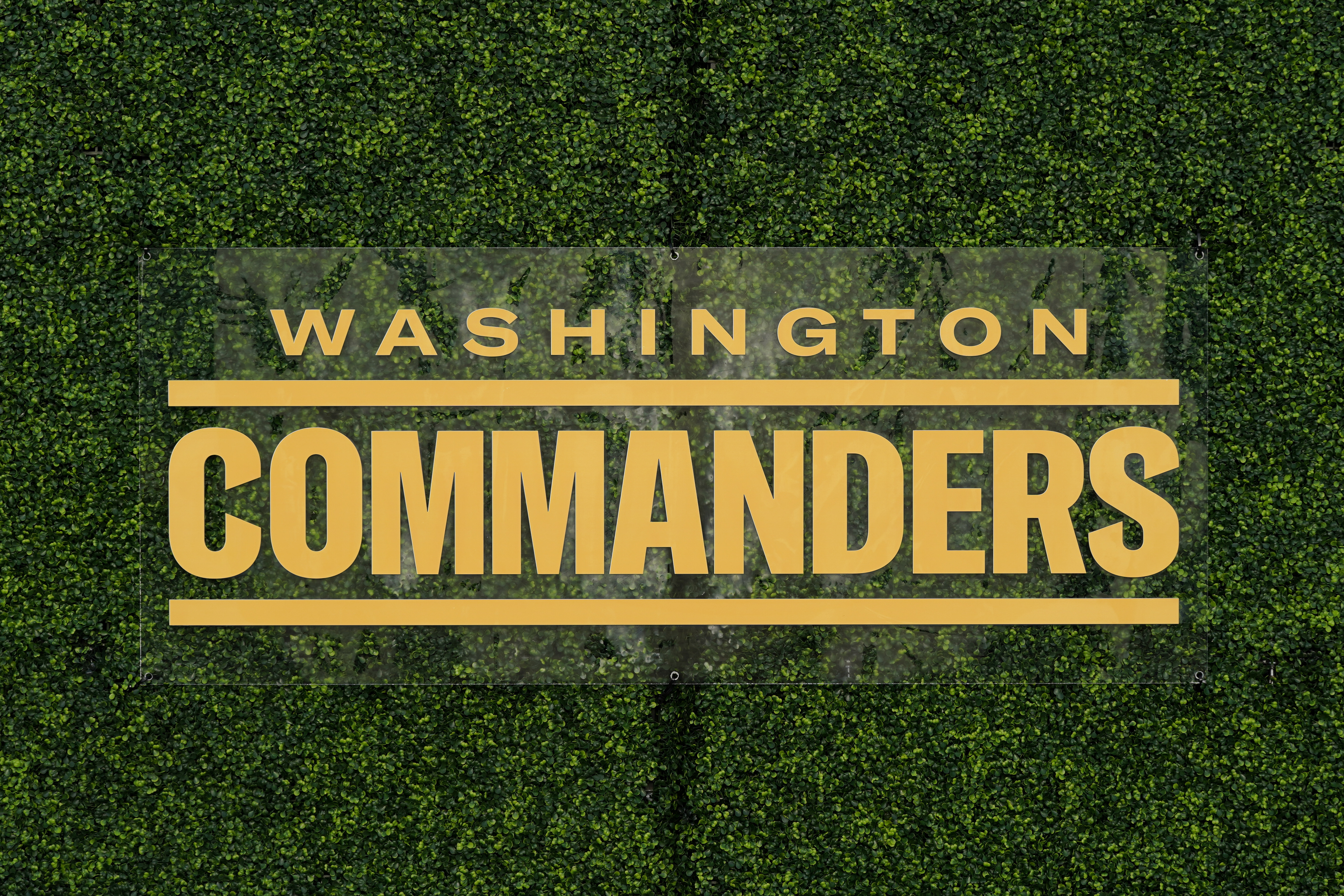 FILE - A Washington Commanders logo is displayed at an event, Feb. 2, 2022, in Landover, Md. 