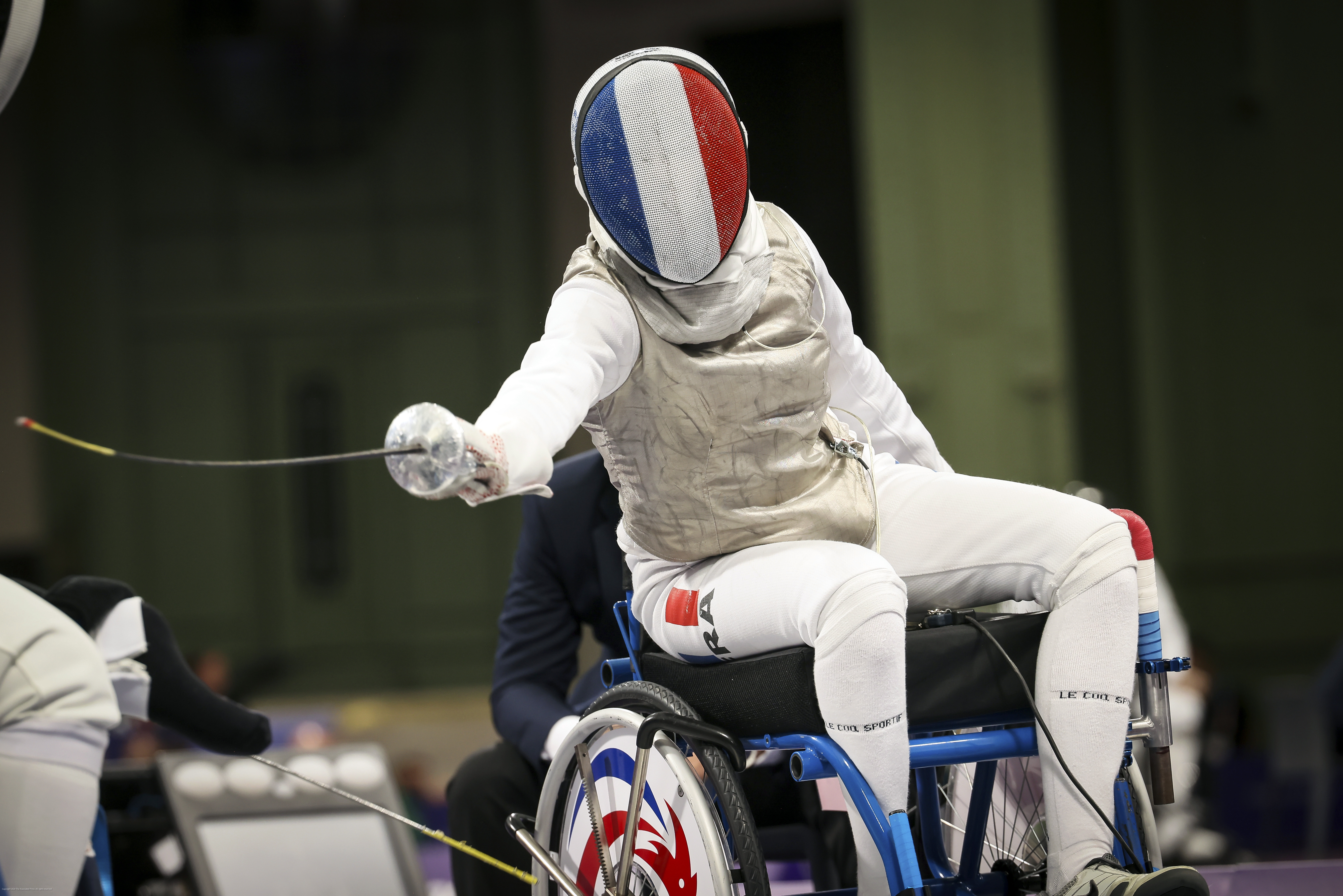 France's Brianna Vide competes against China's Chui Yee Yu during the women's foil wheelchair fencing Category A Repechage Round 4 at the 2024 Paralympics, Wednesday, Sept. 4, 2024, in Paris, France.