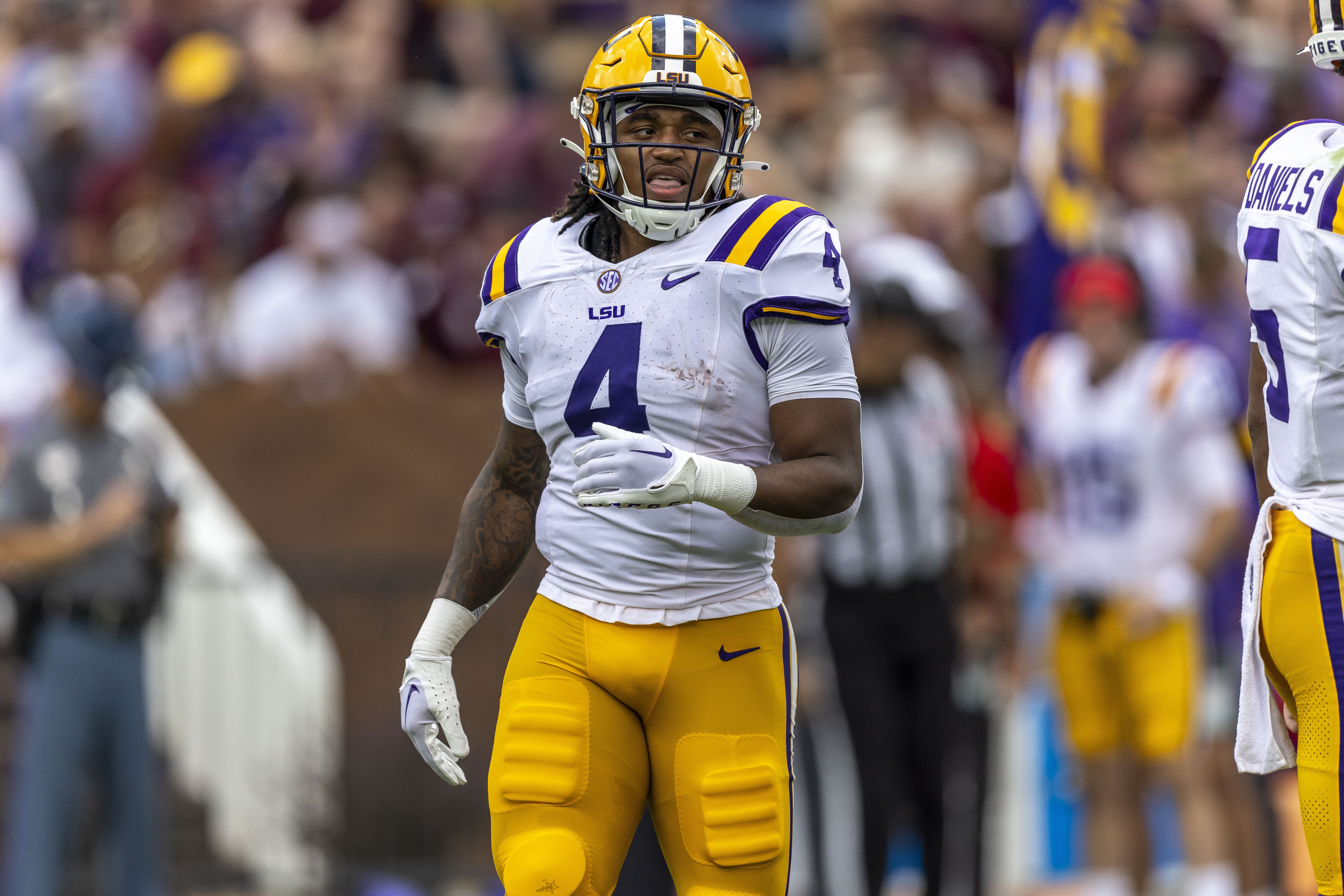 FILE - LSU running back John Emery Jr. (4) during the first half of an NCAA football game, Sept. 16, 2023, in Starkville, Miss. 