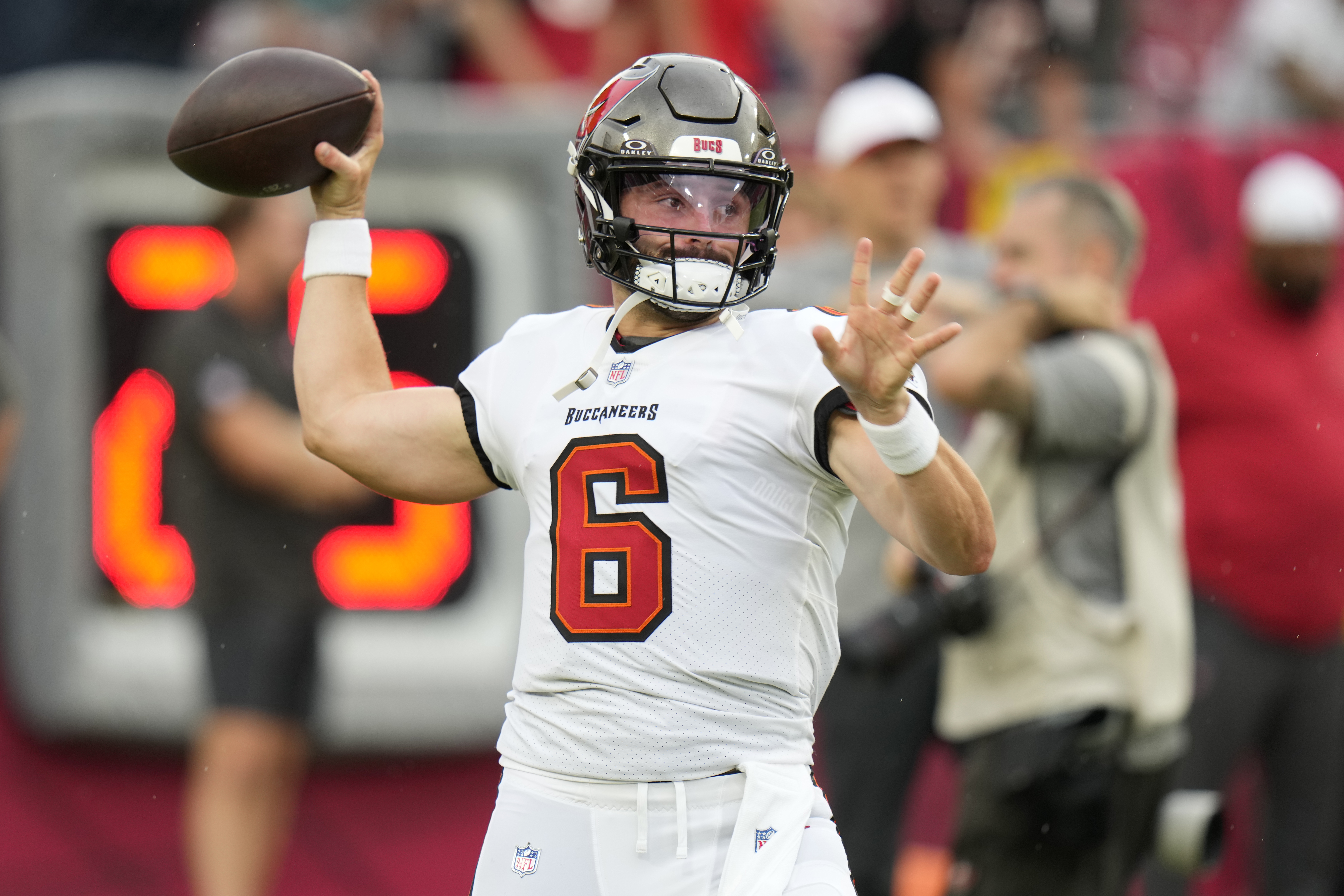Tampa Bay Buccaneers quarterback Baker Mayfield (6) warms up before a pre season NFL football game against the Miami Dolphins, Friday, Aug. 23, 2024, in Tampa, Fla. 