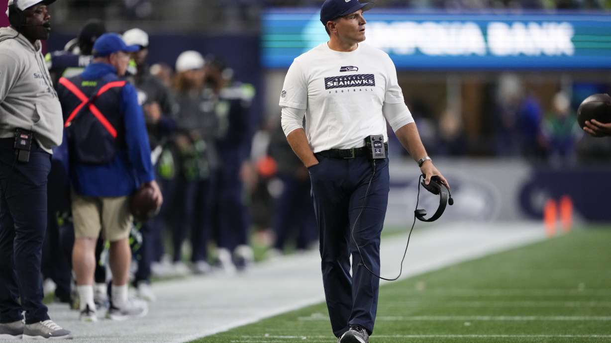 Seattle Seahawks head coach Mike Macdonald looks on during the first half of a preseason NFL football game against the Cleveland Browns, Saturday, Aug. 24, 2024, in Seattle.