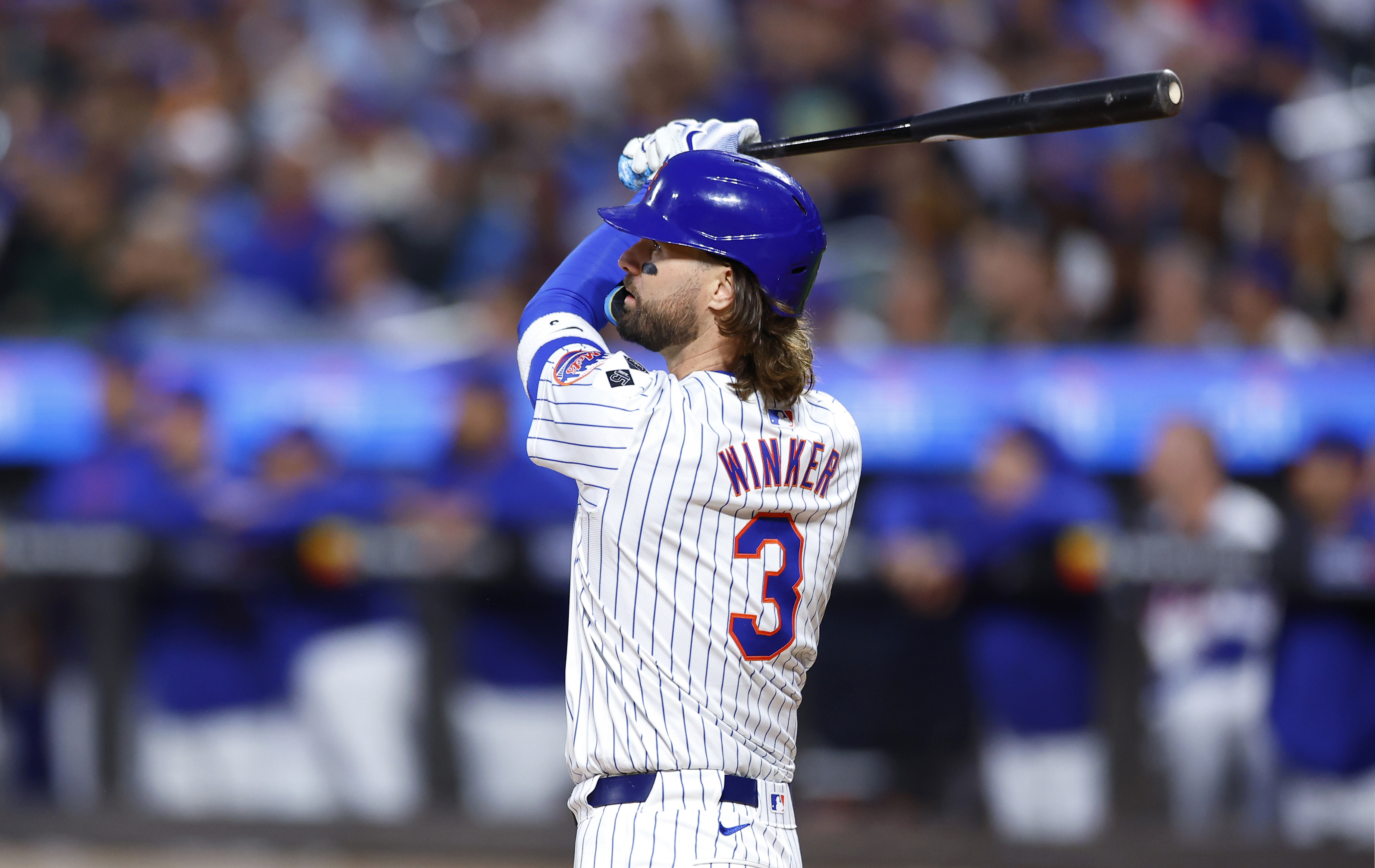 New York Mets' Jesse Winker follows through on a grand slam against the Boston Red Sox during the first inning of a baseball game, Wednesday, Sept. 4, 2024, in New York.