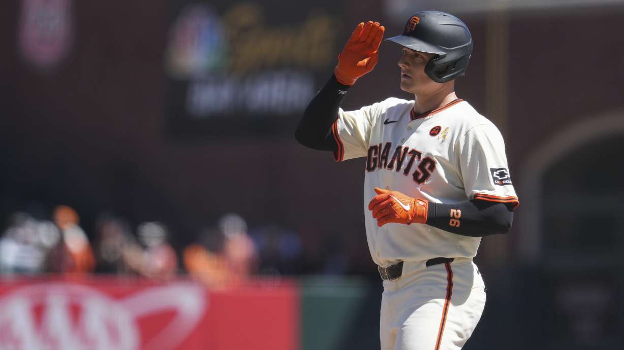 San Francisco Giants' Matt Chapman reacts after hitting a single during the third inning of a baseball game against the Miami Marlins, Sunday, Sept. 1, 2024, in San Francisco.