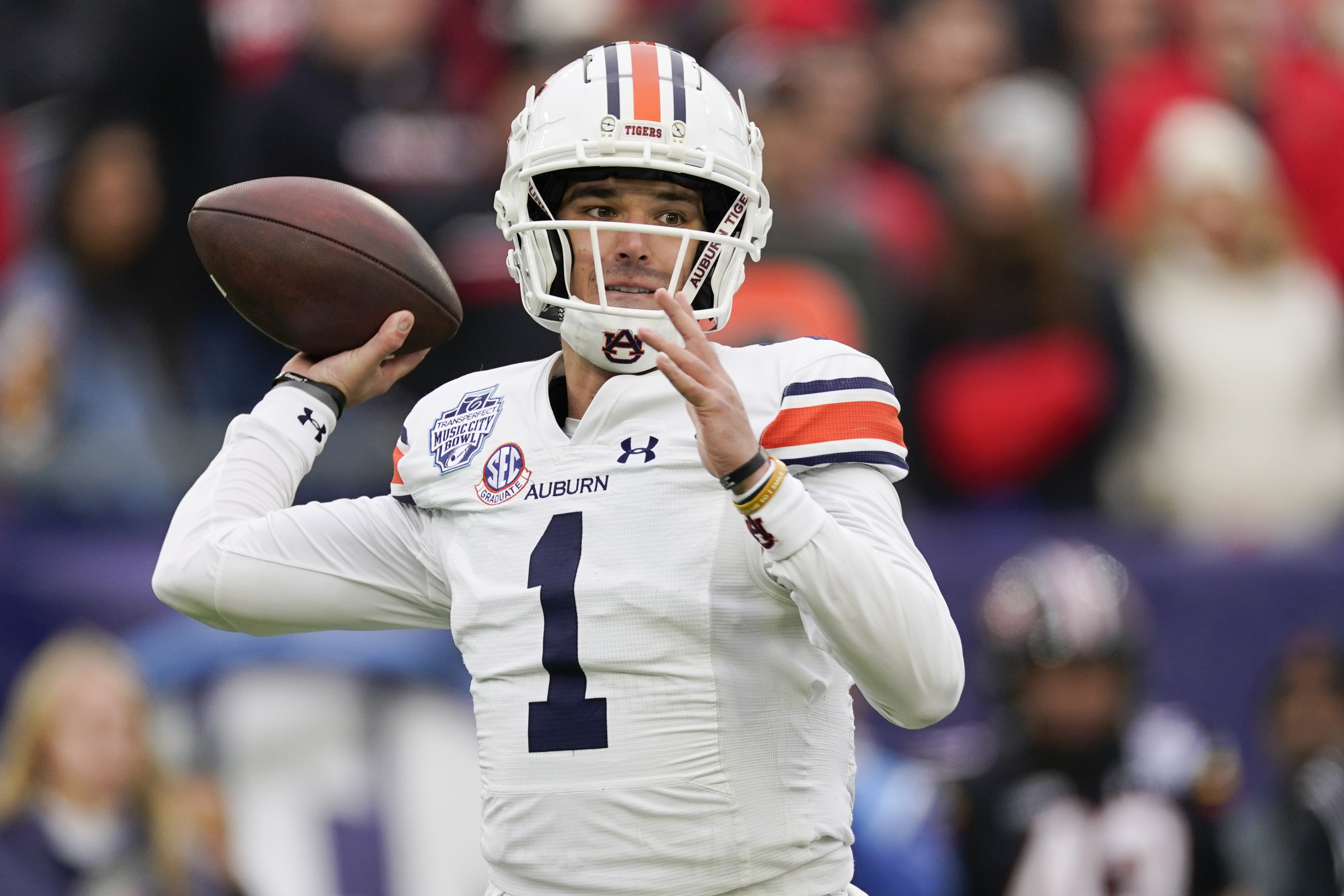 FILE - Auburn quarterback Payton Thorne looks to throw a pass during the first half of the Music City Bowl NCAA college football game against Maryland, Dec. 30, 2023, in Nashville, Tenn. 