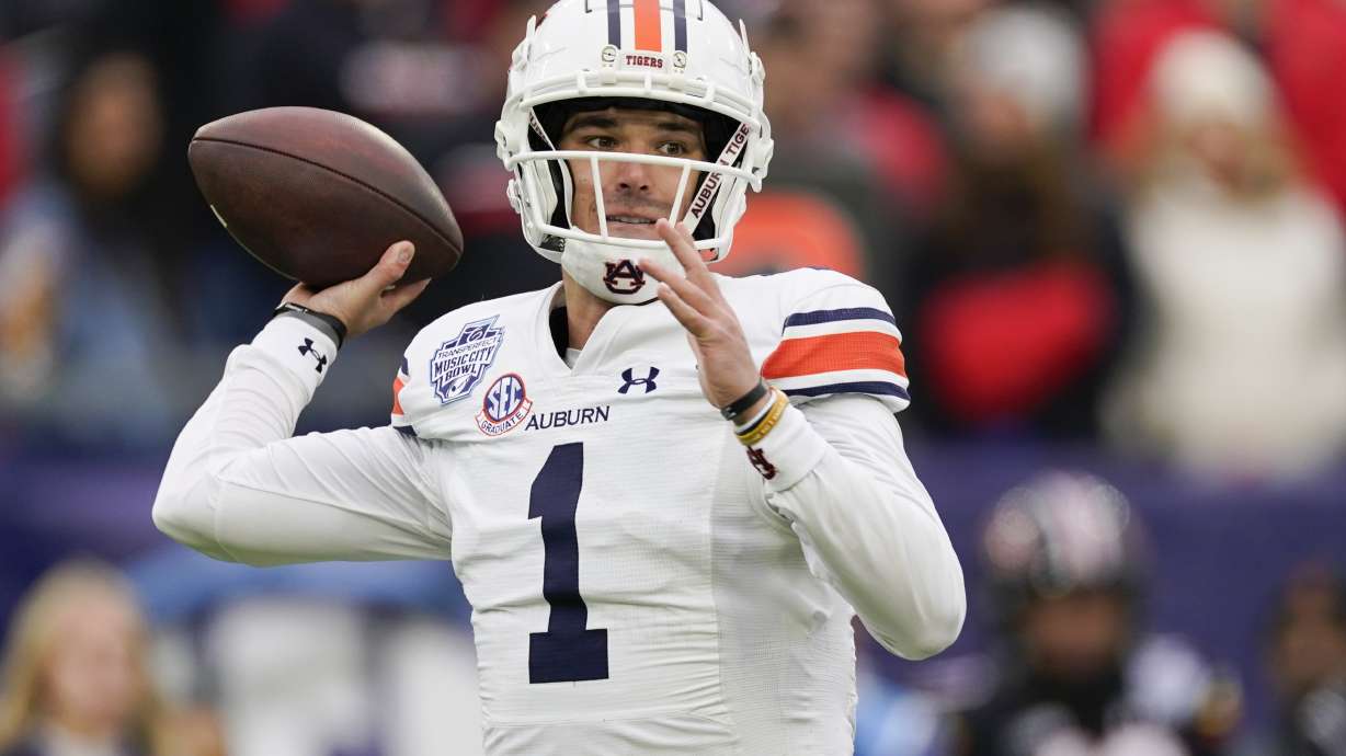 FILE - Auburn quarterback Payton Thorne looks to throw a pass during the first half of the Music City Bowl NCAA college football game against Maryland, Dec. 30, 2023, in Nashville, Tenn.