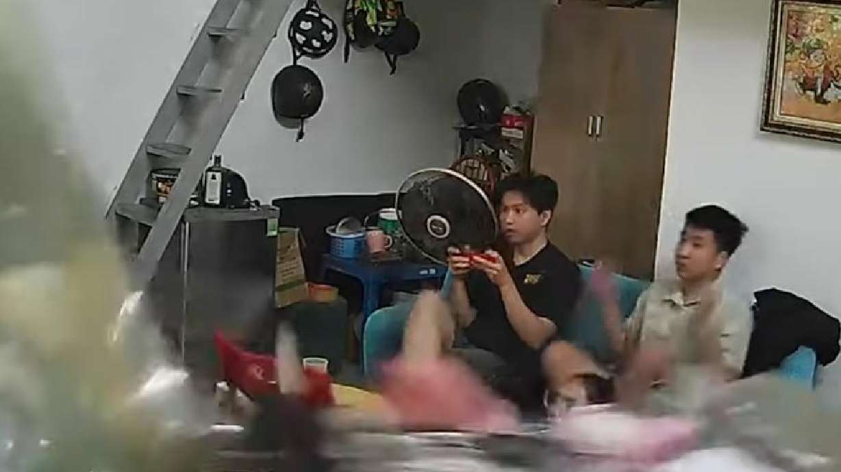 Two unsuspecting people experience the unexpected in this Aug. 19 video from Hanoi, Vietnam.