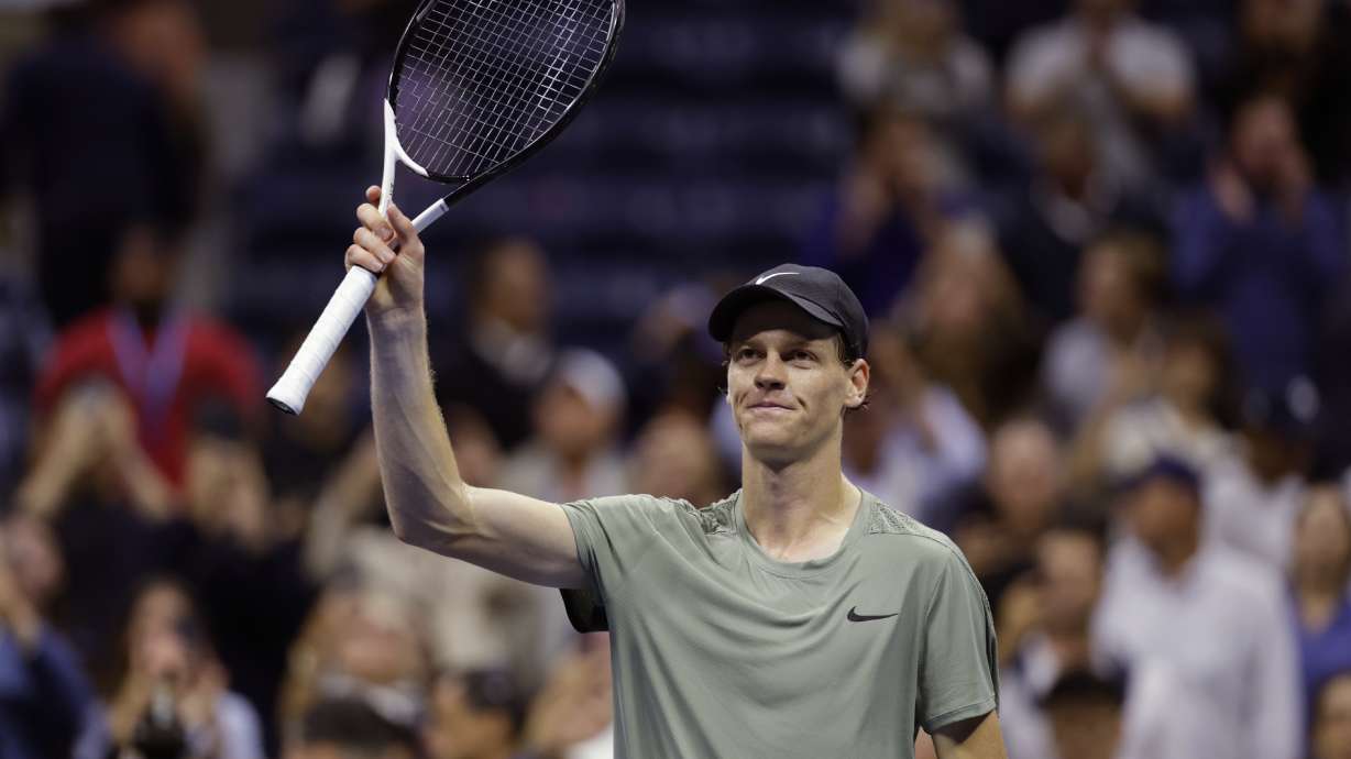 Jannik Sinner, of Italy, acknowledges the crowd after defeating Daniil Medvedev, of Russia, during the quarterfinals of the U.S. Open tennis championships, Wednesday, Sept. 4, 2024, in New York.
