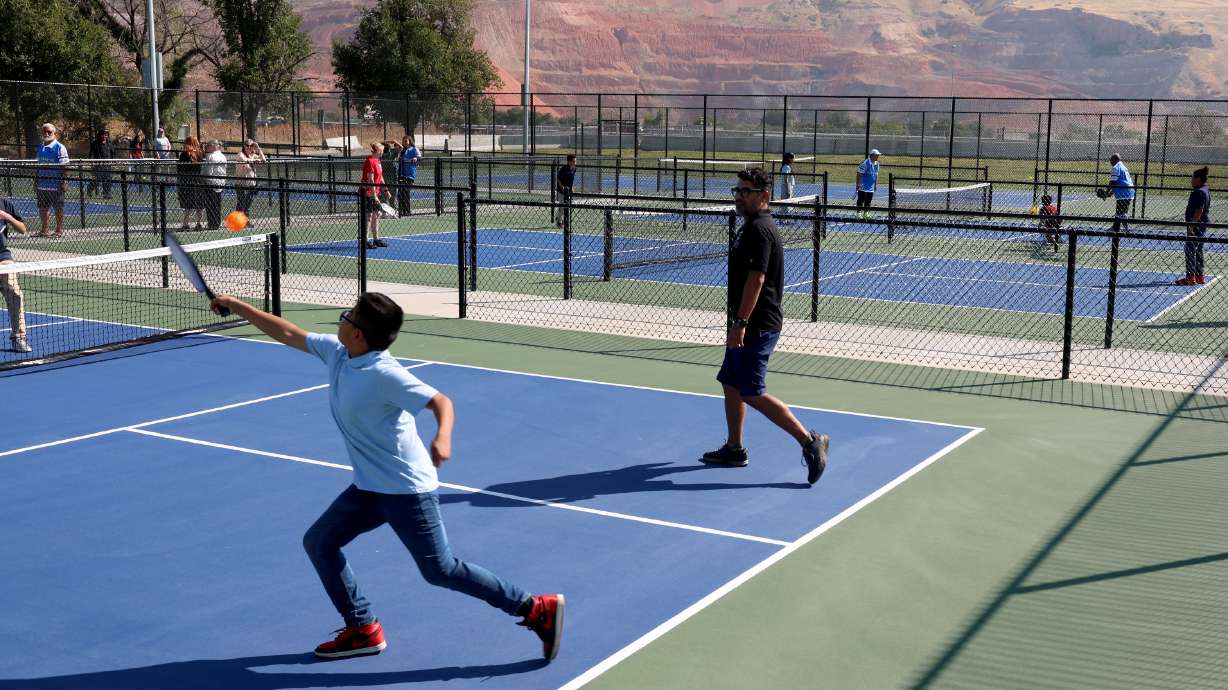 Guadalupe School students play on the new pickleball courts at Rosewood Park in Salt Lake City on Sept. 5. Two Utah men are on a mission to fill a gap in Utah's youth sports infrastructure with a state-of-the-art youth athletic training facility.