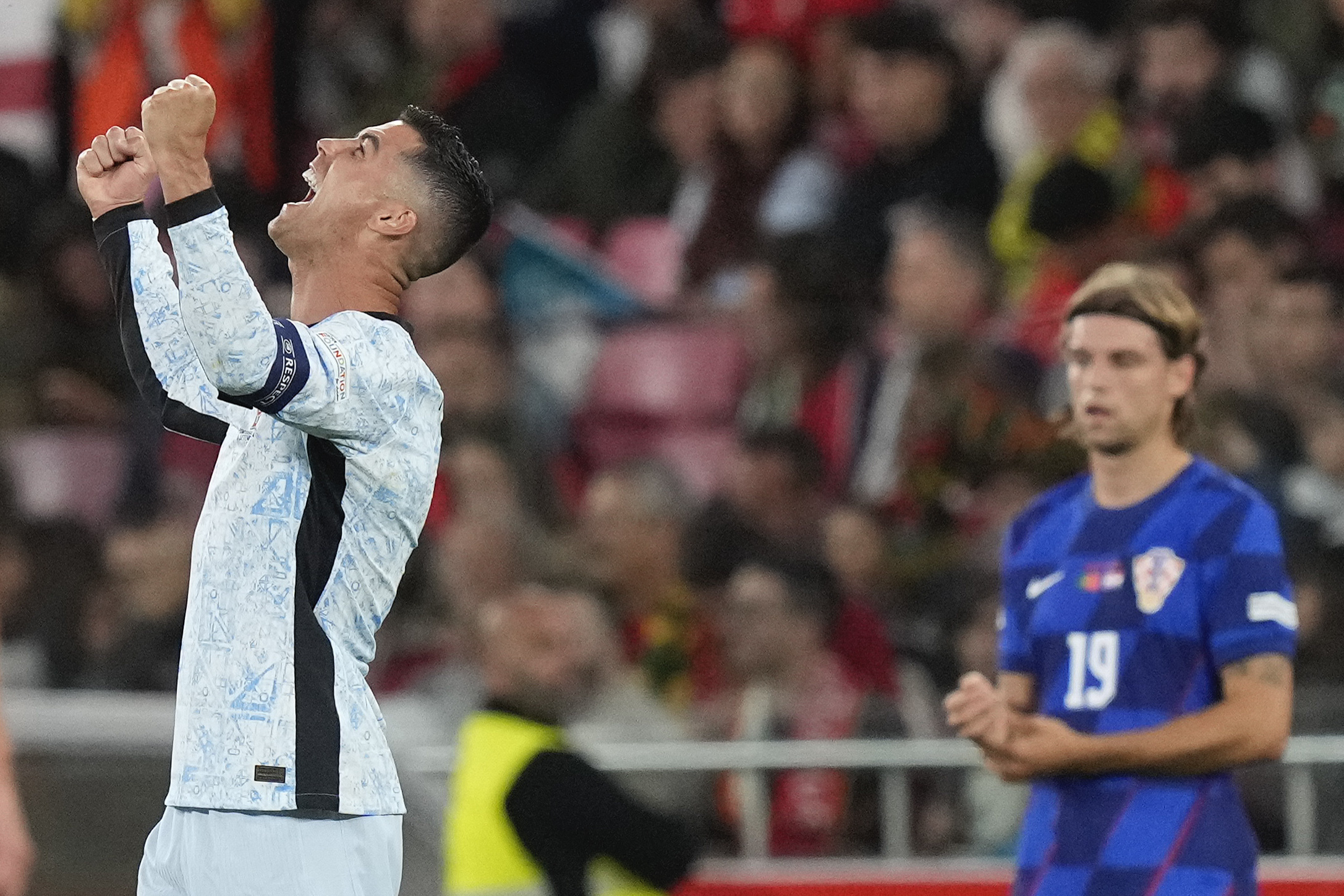 Portugal's Cristiano Ronaldo celebrates after scoring his side's second goal during the UEFA Nations League soccer match between Portugal and Croatia at the Luz stadium in Lisbon, Thursday, Sept. 5, 2024.