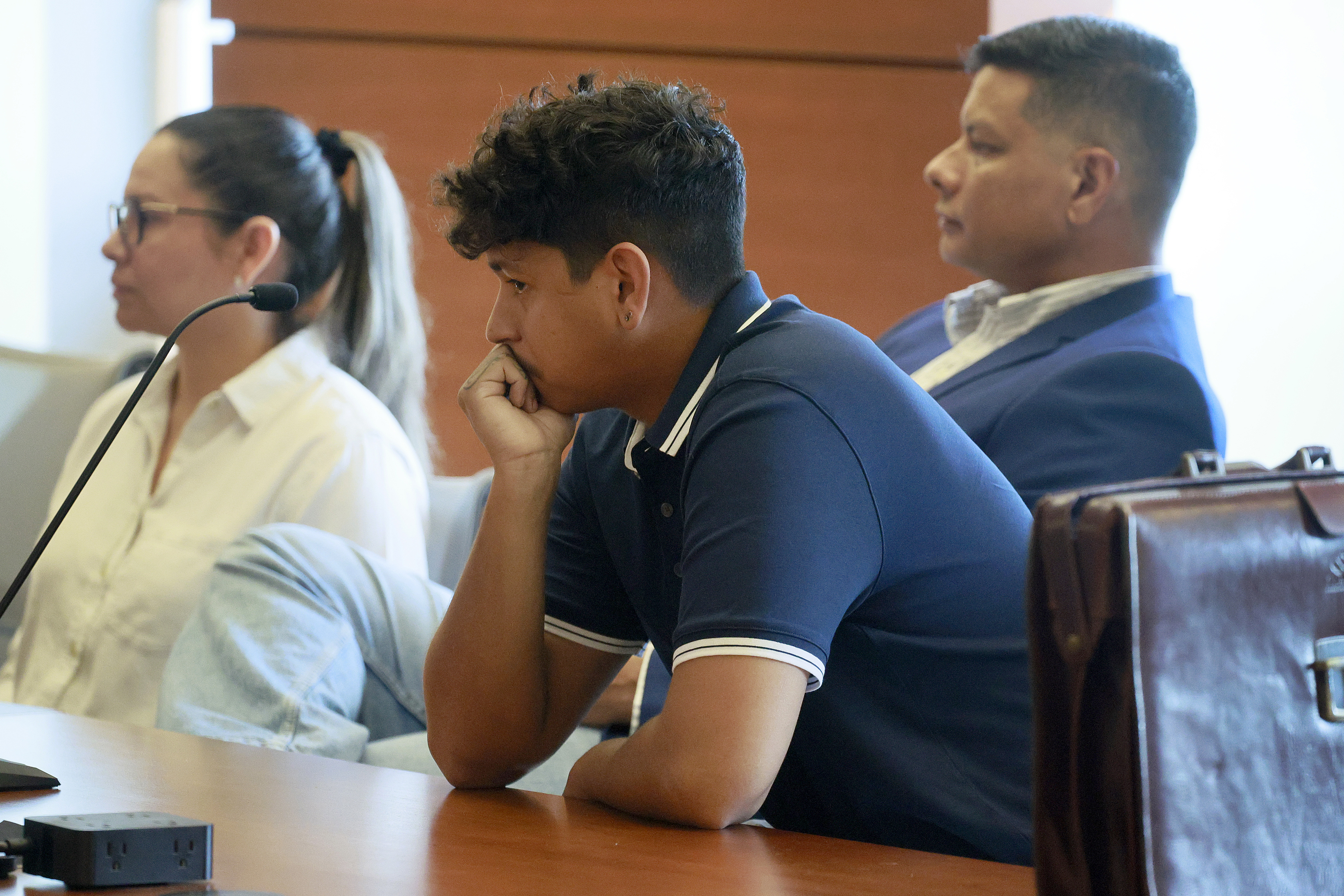 Anthony Borges listens to testimony in Judge Carol-Lisa Phillips' courtroom on Thursday, in Broward County, Fla. The families of the Parkland victims are in court to debate the negotiation of a settlement.