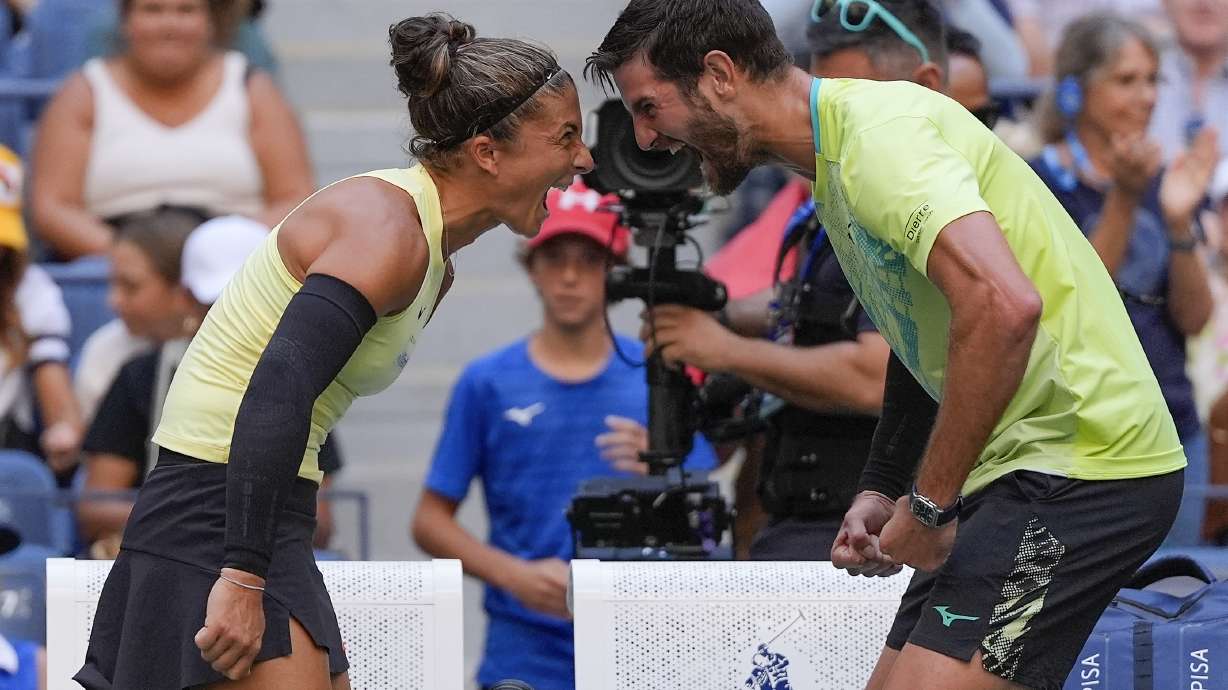 Sara Errani, of Italy, and Andrea Vavassori, of Italy, react after defeating Taylor Townsend, of the United States, and Donald Young, of the United States, in the mixed doubles final of the U.S. Open tennis championships, Thursday, Sept. 5, 2024, in New York.