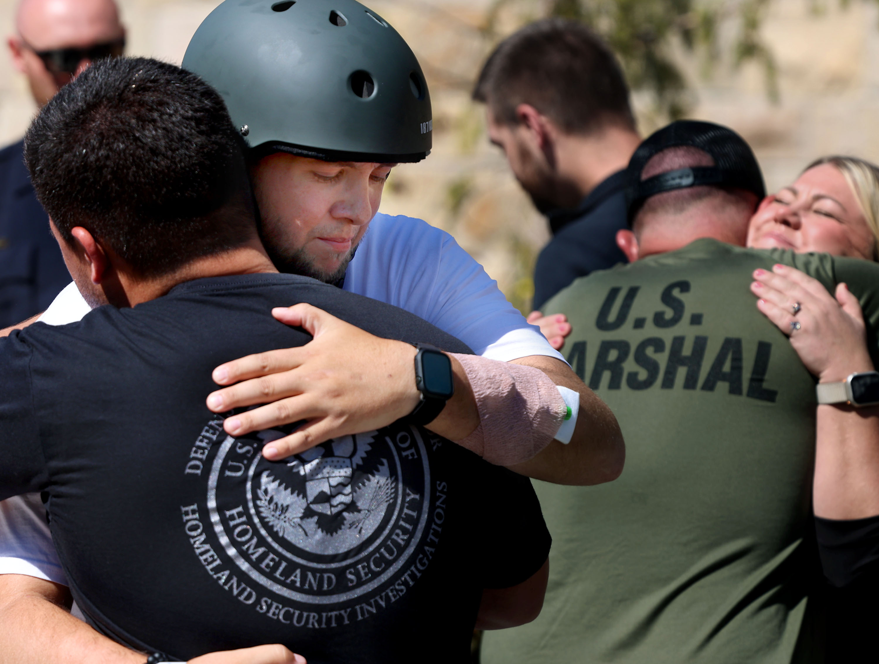 Jared Jensen hugs his friends at the University of Utah Medical Center's Craig Nielsen Rehabilitation Center in Salt Lake City on Thursday. Jensen is at the U. medical center after being diagnosed with Stage 4 brain cancer and undergoing surgery.