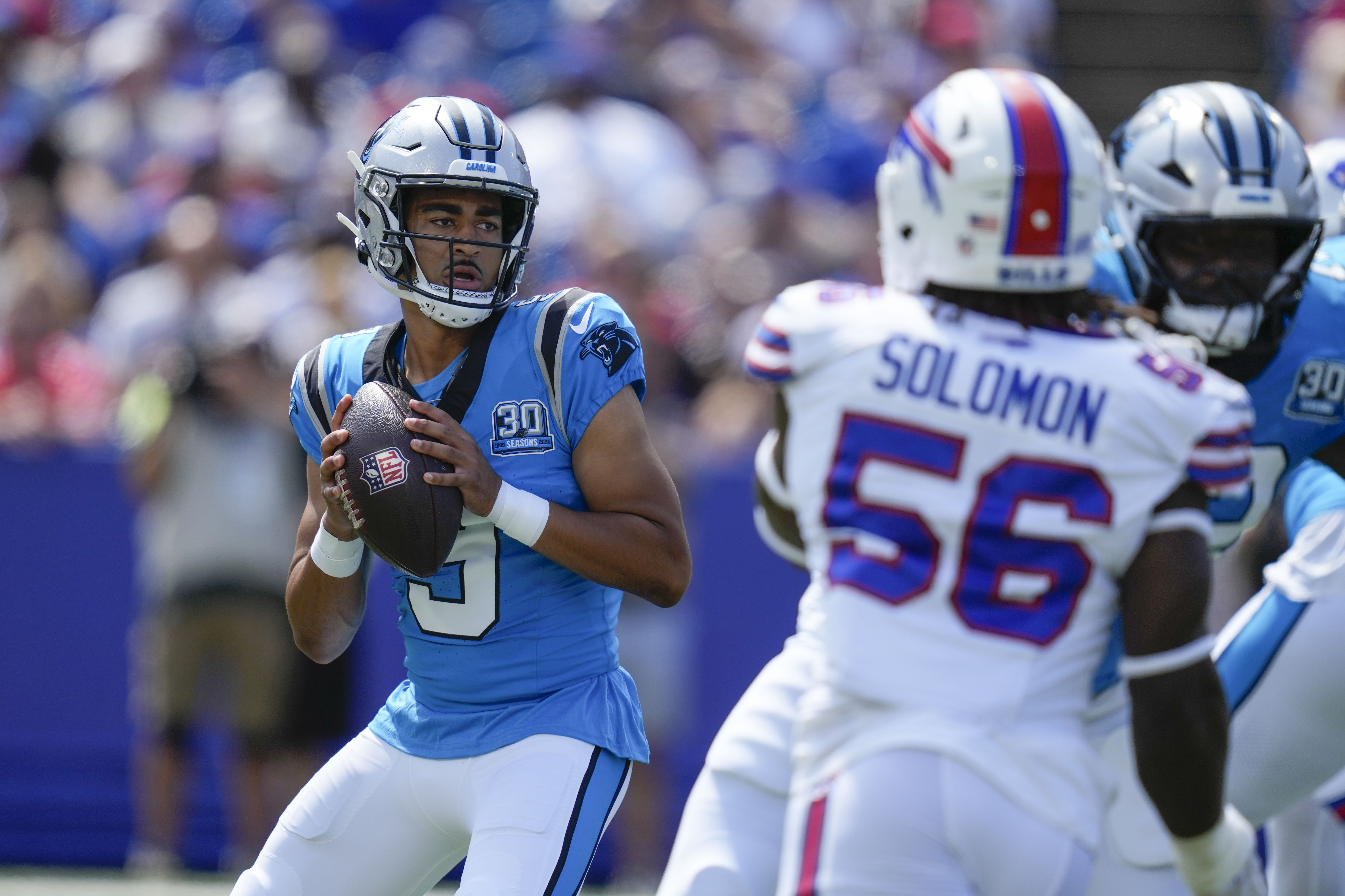 Carolina Panthers quarterback Bryce Young (9) drops back to pass in the first half of an NFL preseason football game against the Buffalo Bills, Saturday, Aug. 24, 2024, in Orchard Park, N.Y. 