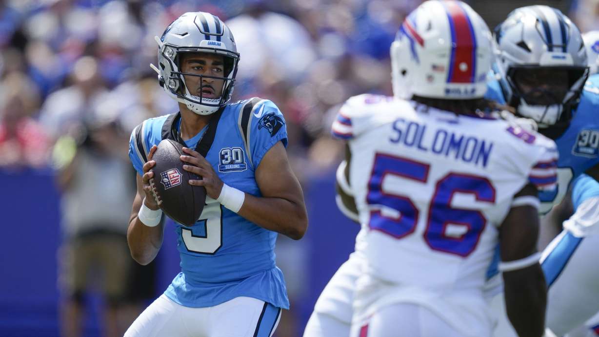 Carolina Panthers quarterback Bryce Young (9) drops back to pass in the first half of an NFL preseason football game against the Buffalo Bills, Saturday, Aug. 24, 2024, in Orchard Park, N.Y.