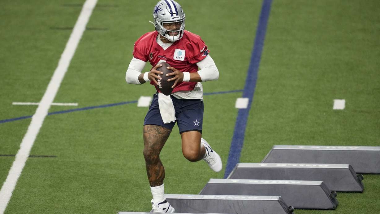 Dallas Cowboys quarterback Dak Prescott (4) runs drills during an NFL football practice at the team's training facility, Wednesday, Aug. 28, 2024, in Frisco, Texas.