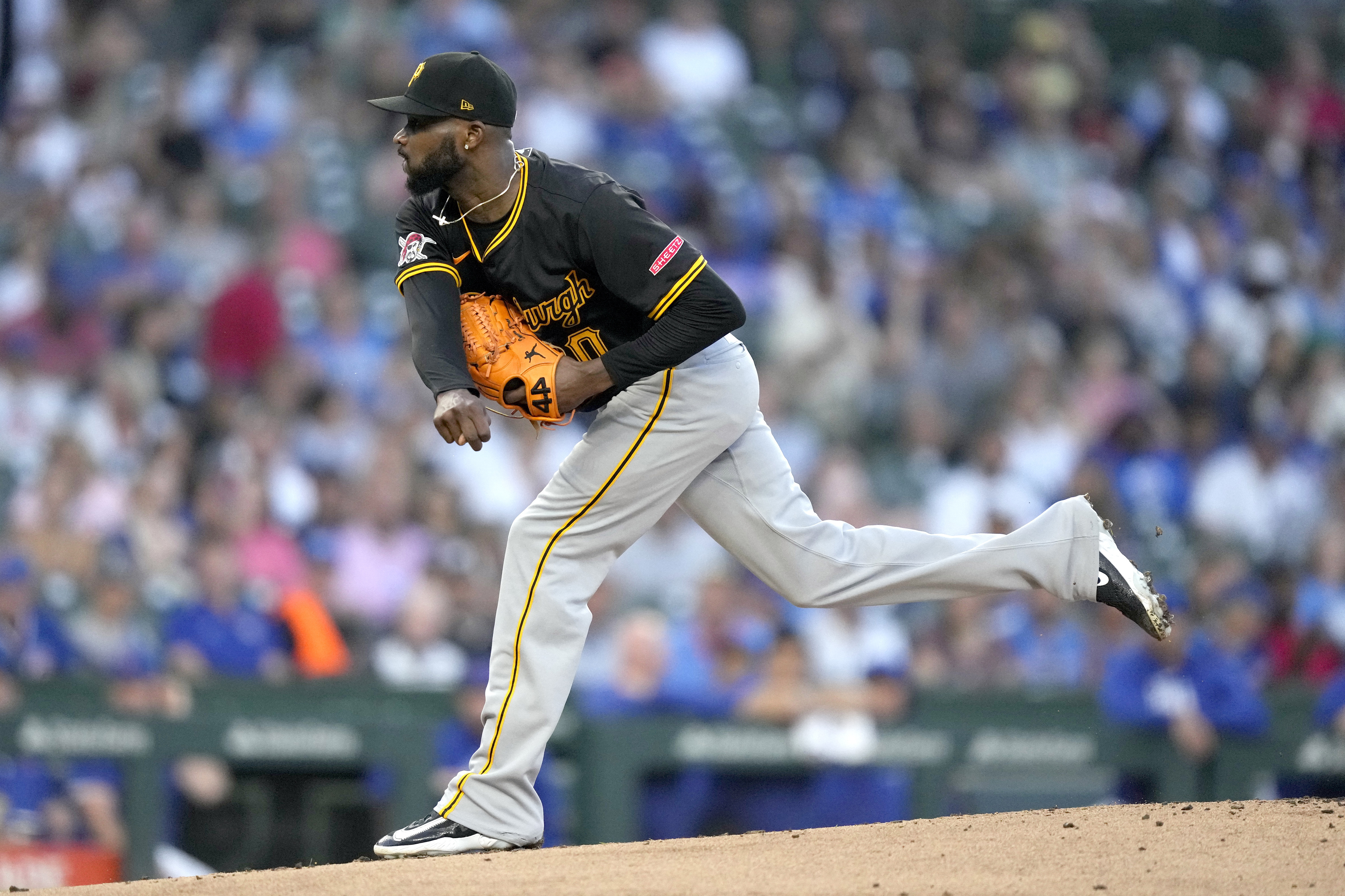 Pittsburgh Pirates starting pitcher Domingo Germán follows through during the first inning of a baseball game against the Chicago Cubs on Wednesday, Sept. 4, 2024, in Chicago.