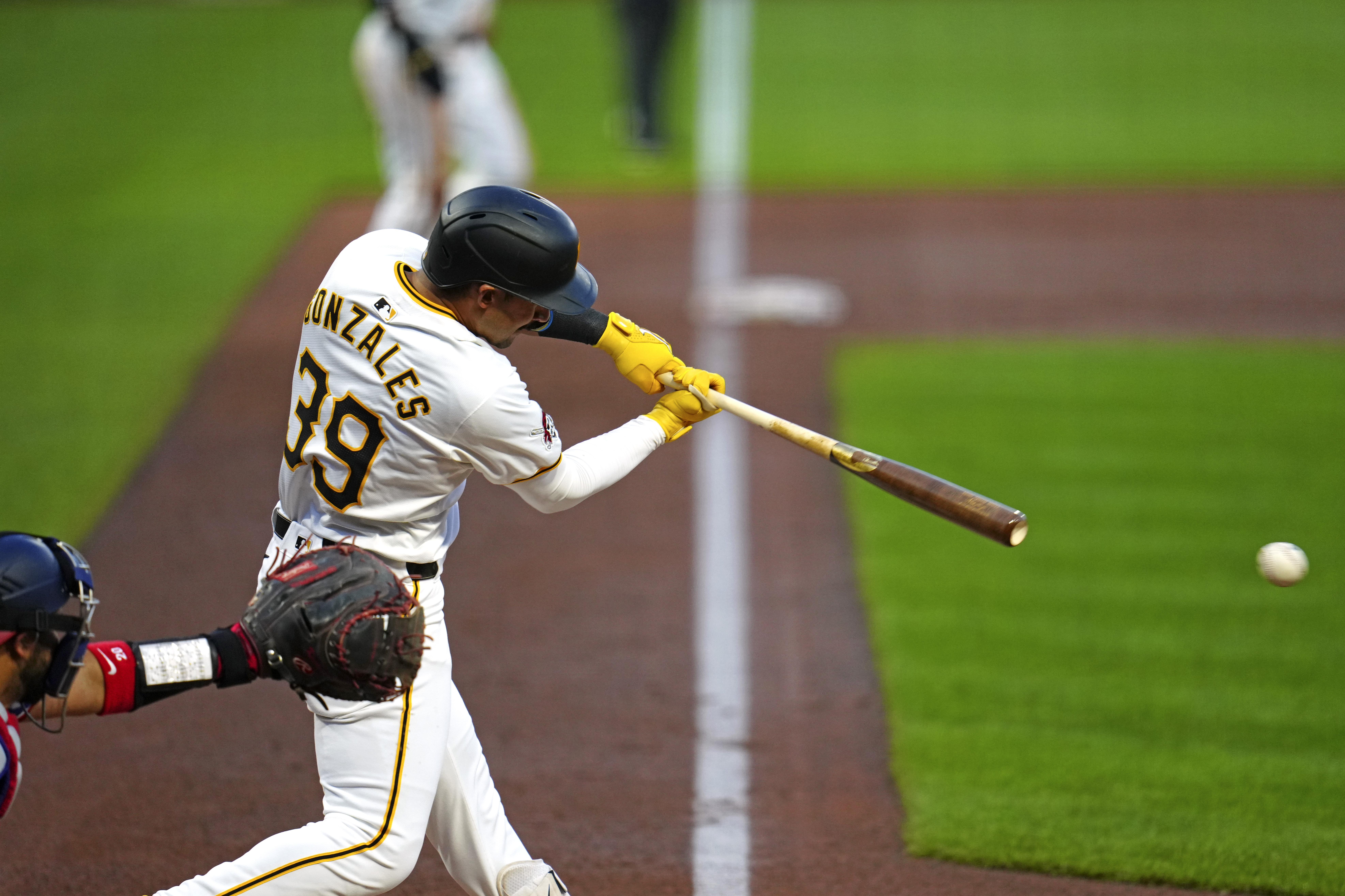 Pittsburgh Pirates' Nick Gonzales singles off Washington Nationals starting pitcher Jake Irvin, driving in two runs, during the second inning of a baseball game in Pittsburgh, Thursday, Sept. 5, 2024.