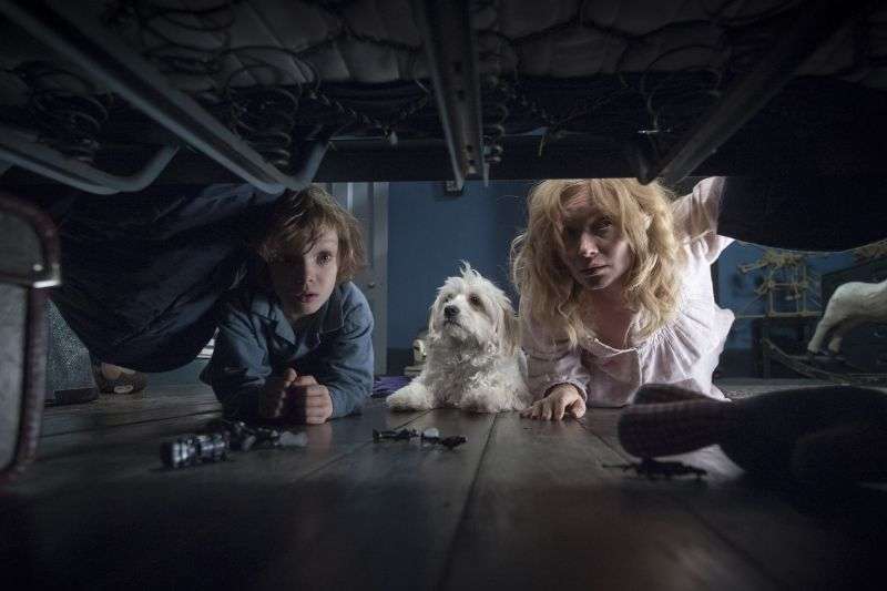 This image shows Noah Wiseman, left, and Essie Davis in a scene from the film "The Babadook."