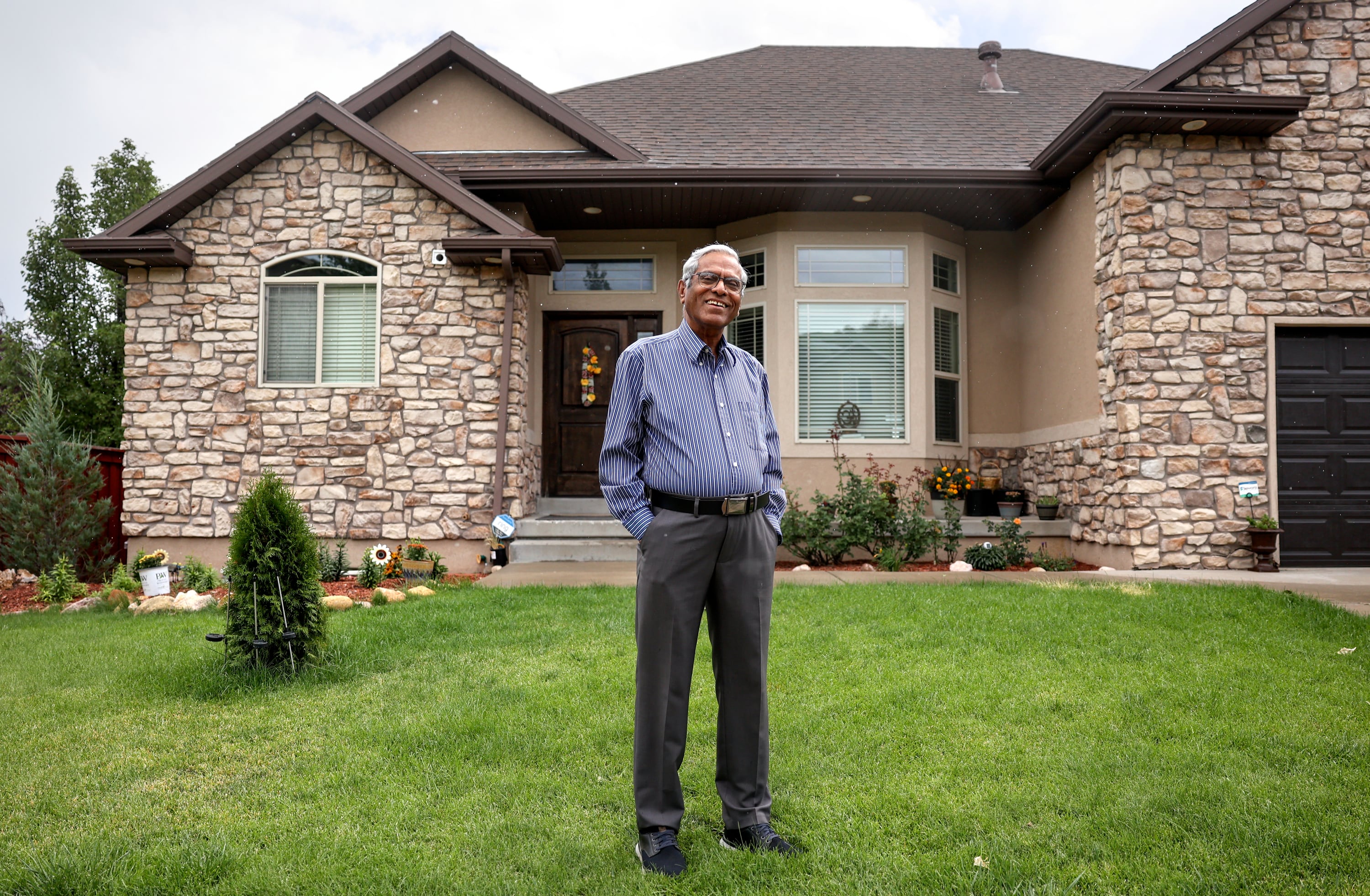 Satish Dharni poses for a portrait outside his home in Draper on Aug. 23. Dharni said he is registered as an independent but plans on voting Republican in the presidential election.