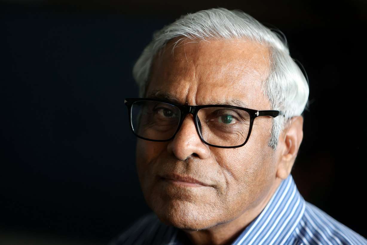 Satish Dharni poses for a portrait at home in Draper, Aug. 23. Dharni said he is registered as an independent but plans on voting Republican in the presidential election.
