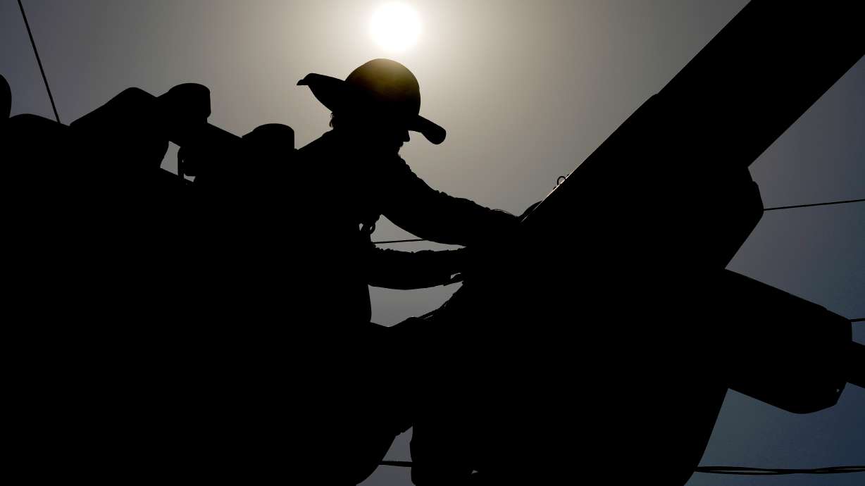 Hiring by America's employers picked up a bit in August, and the unemployment rate dipped for the first time since March in a sign that the job market may be cooling but remains sturdy.