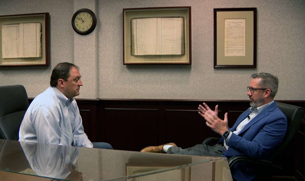 Jason Wallace, right, vice president of claims at Bear River Mutual Insurance Company, tells KSL’s Matt Gephardt that proving loss in value is very difficult because it’s not incurred until the vehicle is sold.