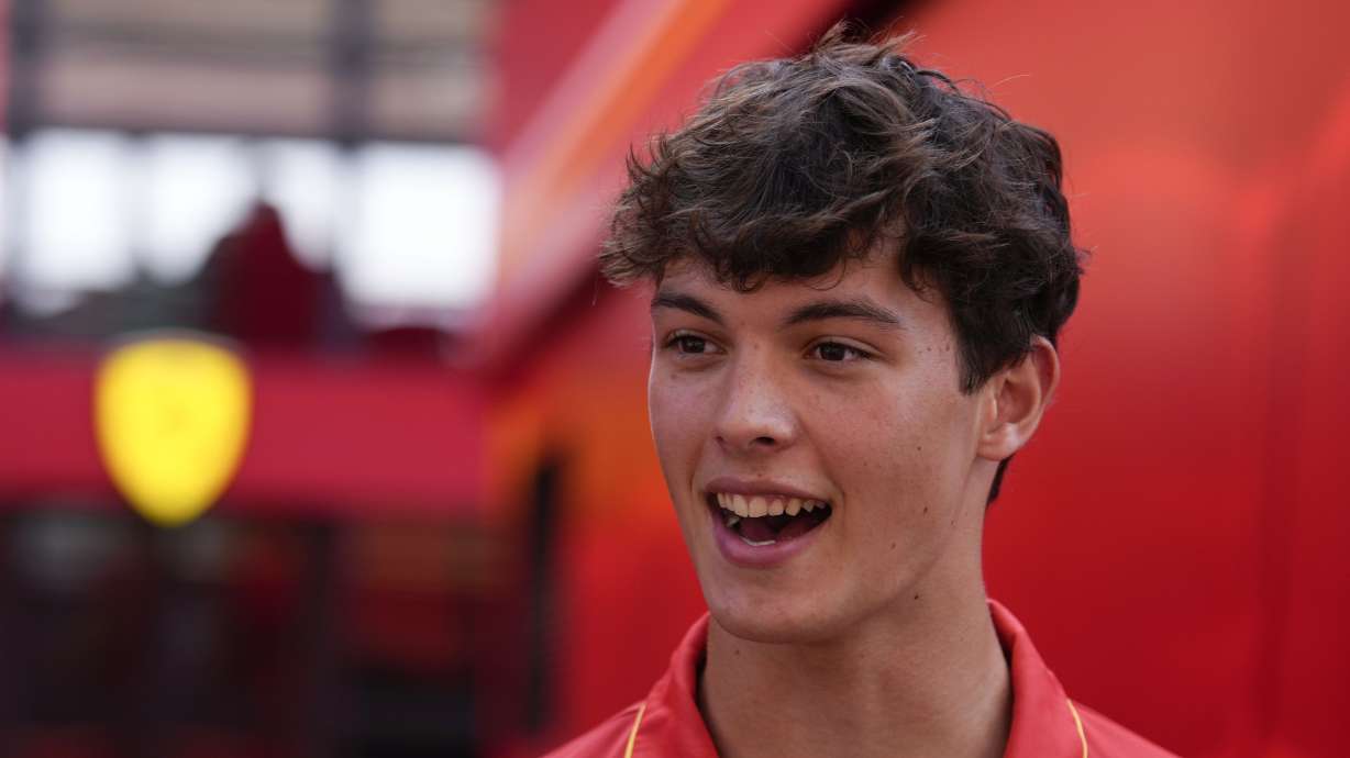 Ferrari driver Oliver Bearman talks in the paddock at the Monza racetrack, in Monza, Italy, Thursday, Aug.29, 2024. The Formula one race will be held on Sunday.
