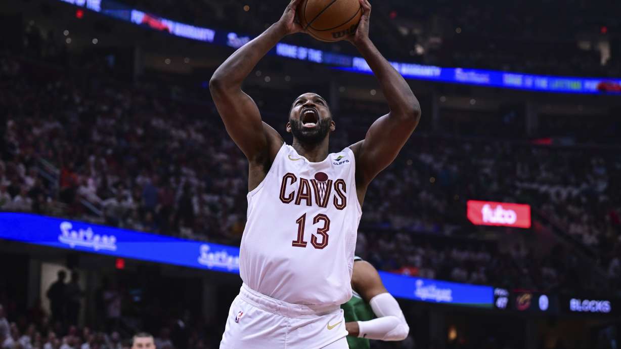 FILE - Cleveland Cavaliers center Tristan Thompson (13) goes up for a dunk during the first half of Game 4 of an NBA basketball second-round playoff series against the Boston Celtics, May 13, 2024, in Cleveland.