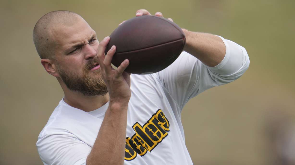 FILE - Pittsburgh Steelers tight end Pat Freiermuth catches a pass during the NFL football team's training camp in Latrobe, Pa., July 25, 2024.