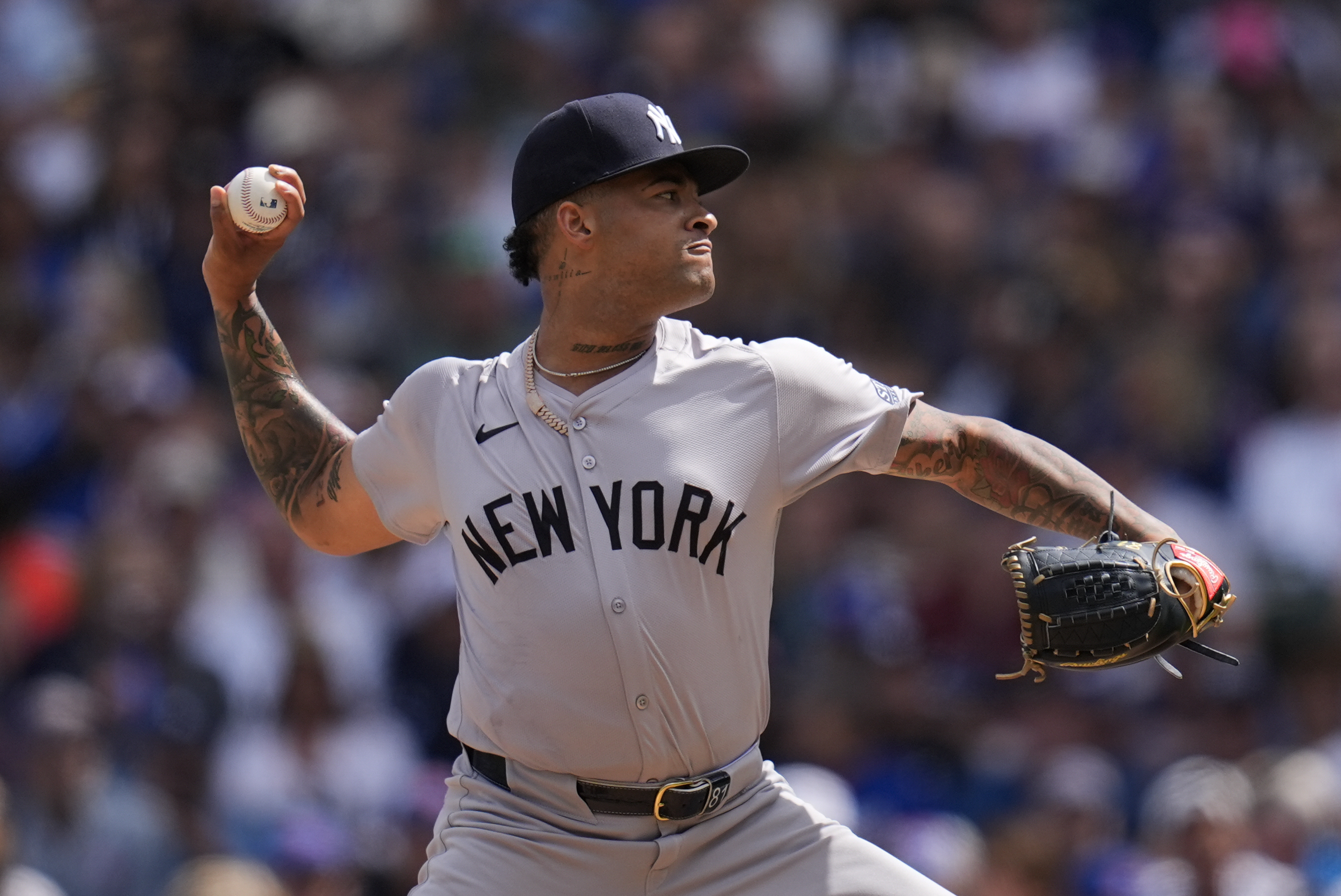 New York Yankees starting pitcher Luis Gil throws against the Chicago Cubs during the first inning of a baseball game Friday, Sept. 6, 2024, in Chicago.